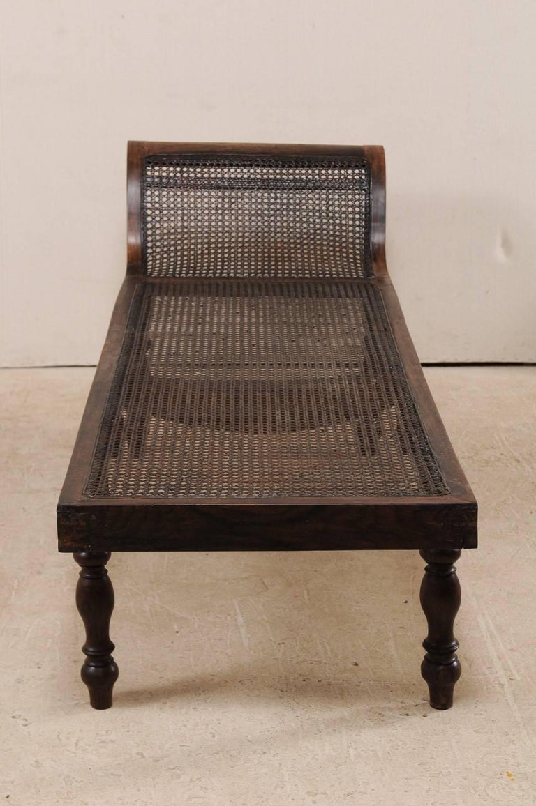 Turn of the Century British Colonial Wood Chaise Longue with Caned Back
