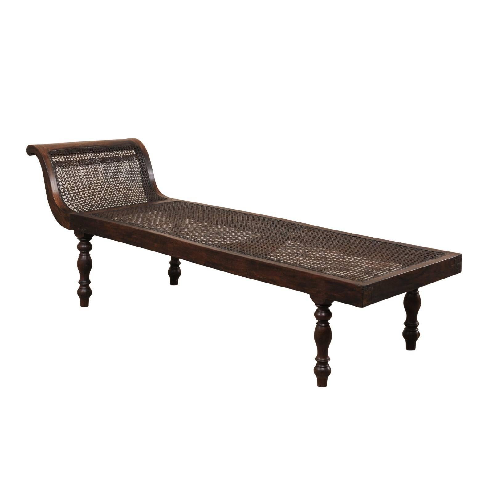 Turn of the Century British Colonial Wood Chaise Longue with Caned Back
