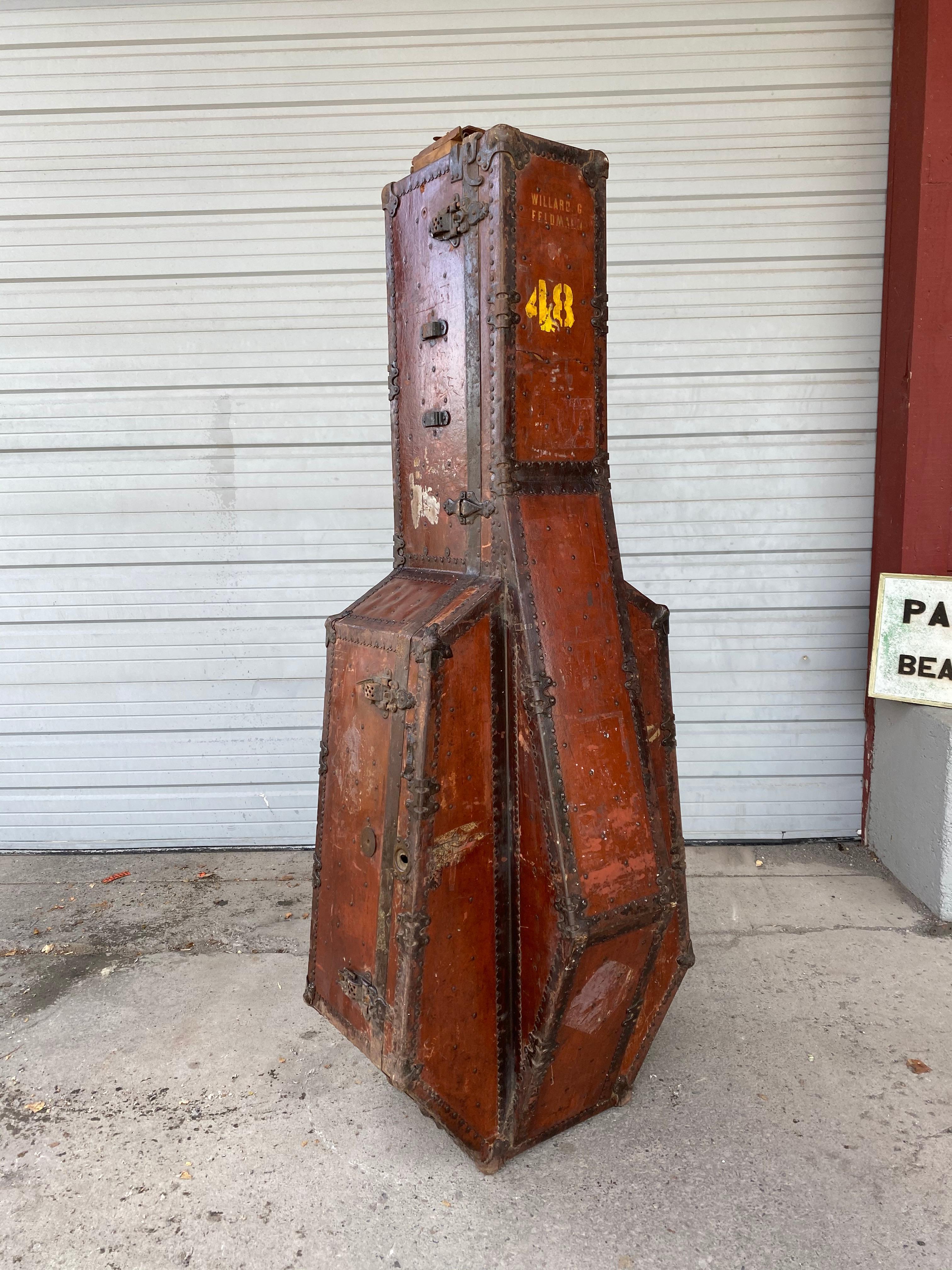 Unusual double bass shipping trunk / case, manufactured by Central Factory Trunk, Simons & Co, Phila. Amazing cubist design, stunning hardware, detailing, retains original finish. Patina, wear consistent with age and use, also retains original