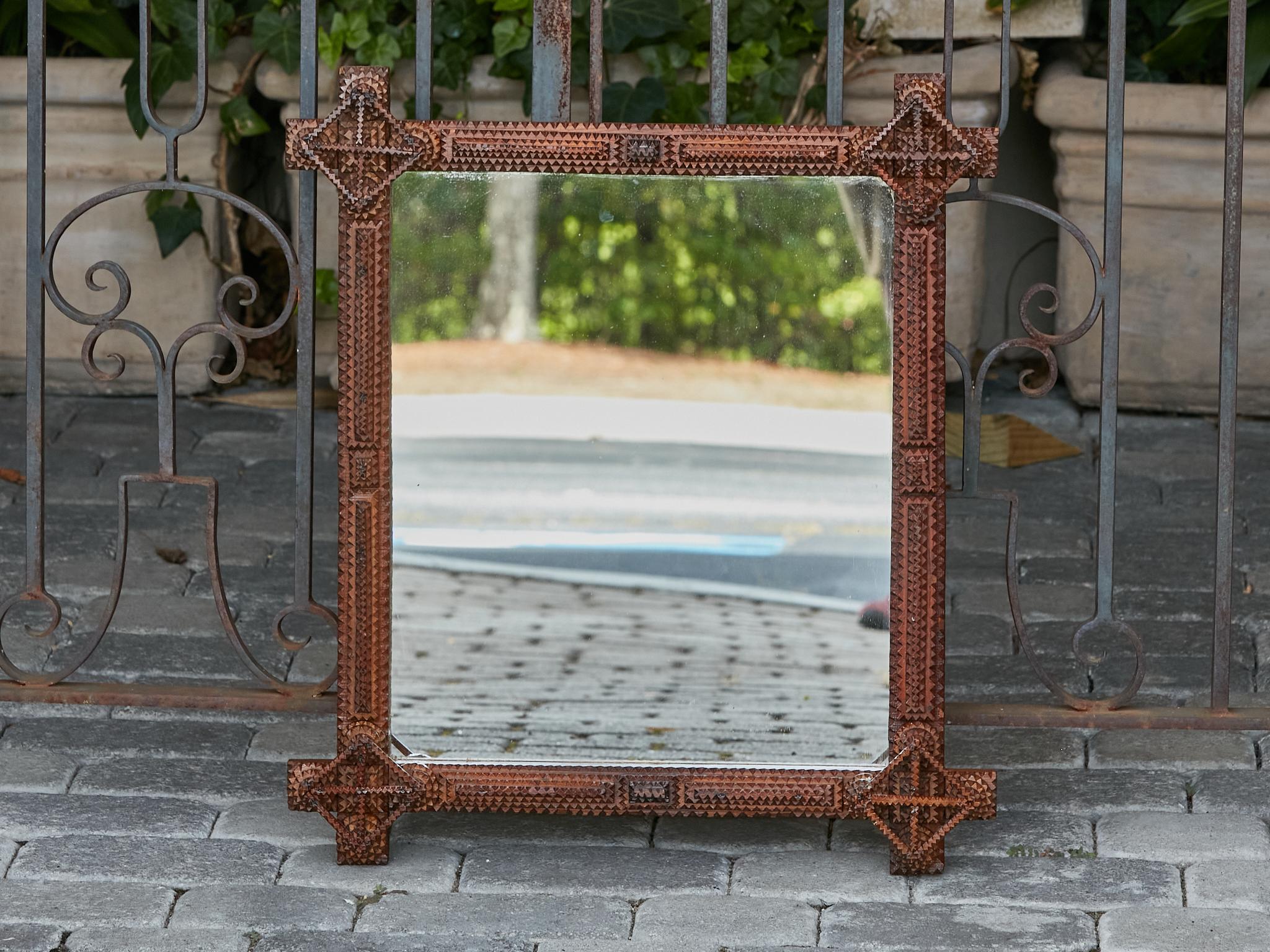 Folk Art Turn of the Century French Carved Tramp Art Mirror with Geometric Motifs, 1900s For Sale
