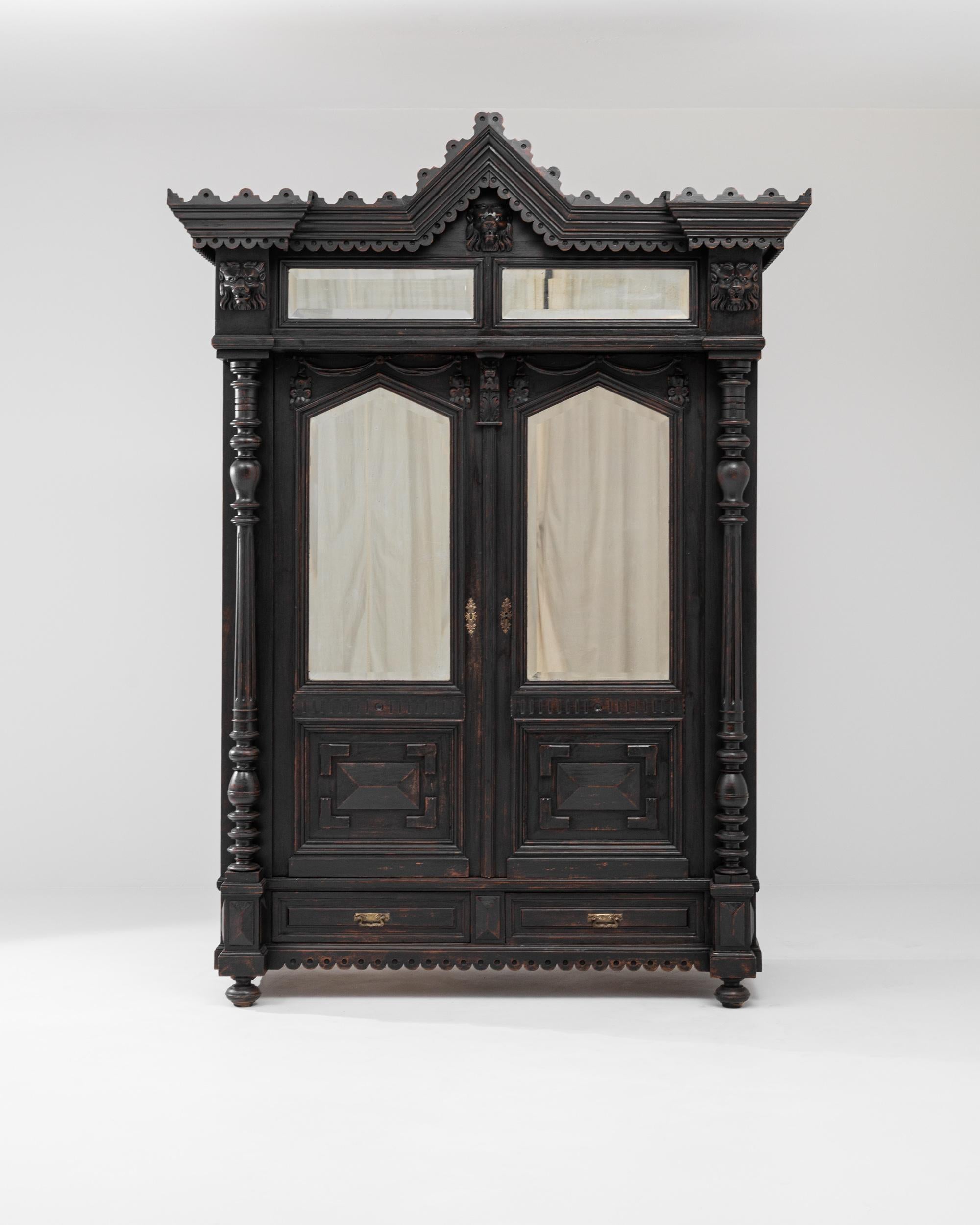 Rich with ornate detail, this beautiful Neo-Renaissance cabinet makes a truly unique period piece. Built in France at the turn of the century, the magnificent case is crowned by a peaked cornice: below, diamond-point moldings, turned columns and