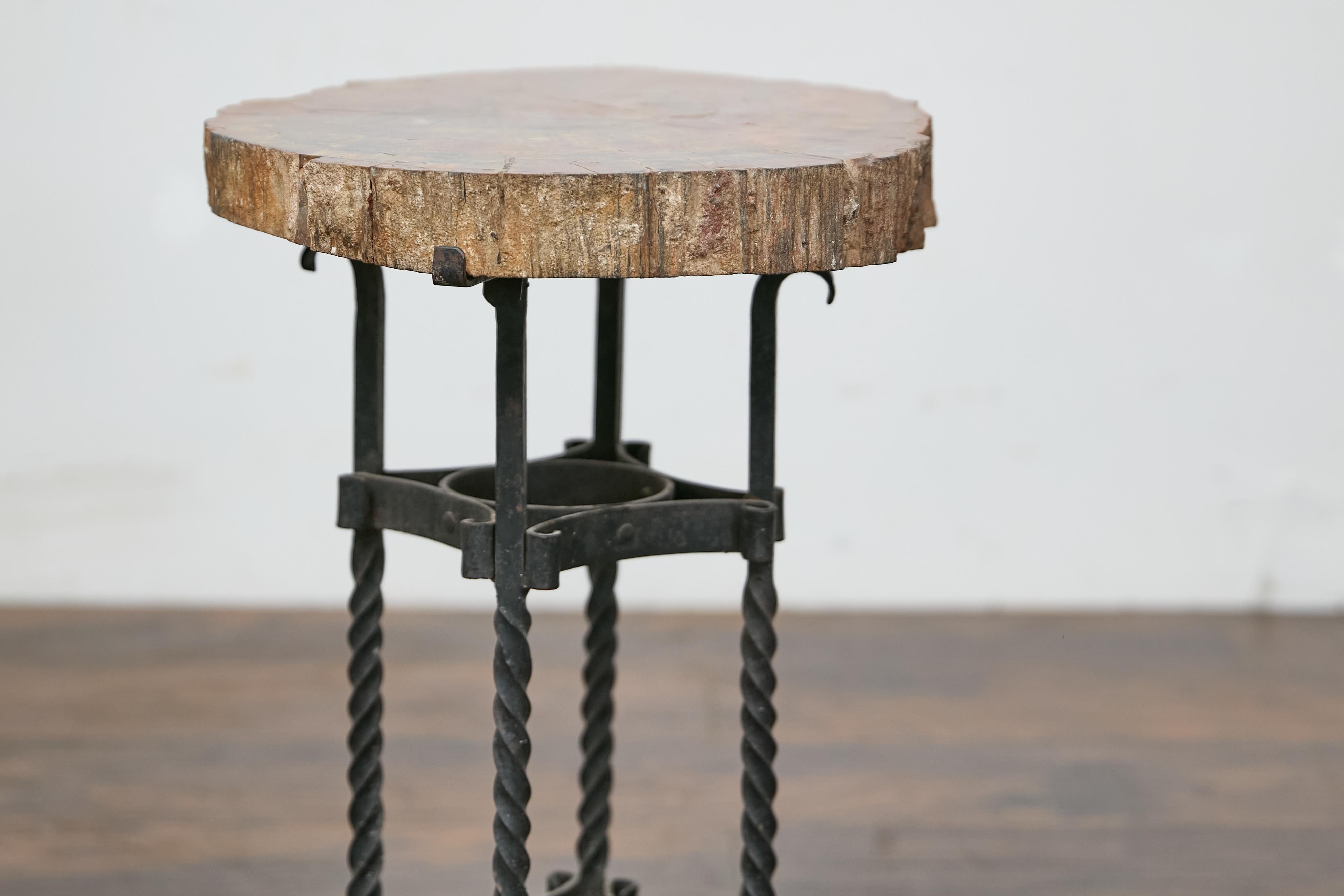 20ième siècle Table d'appoint française du début du siècle, plateau en bois pétrifié et base en fer forgé en vente