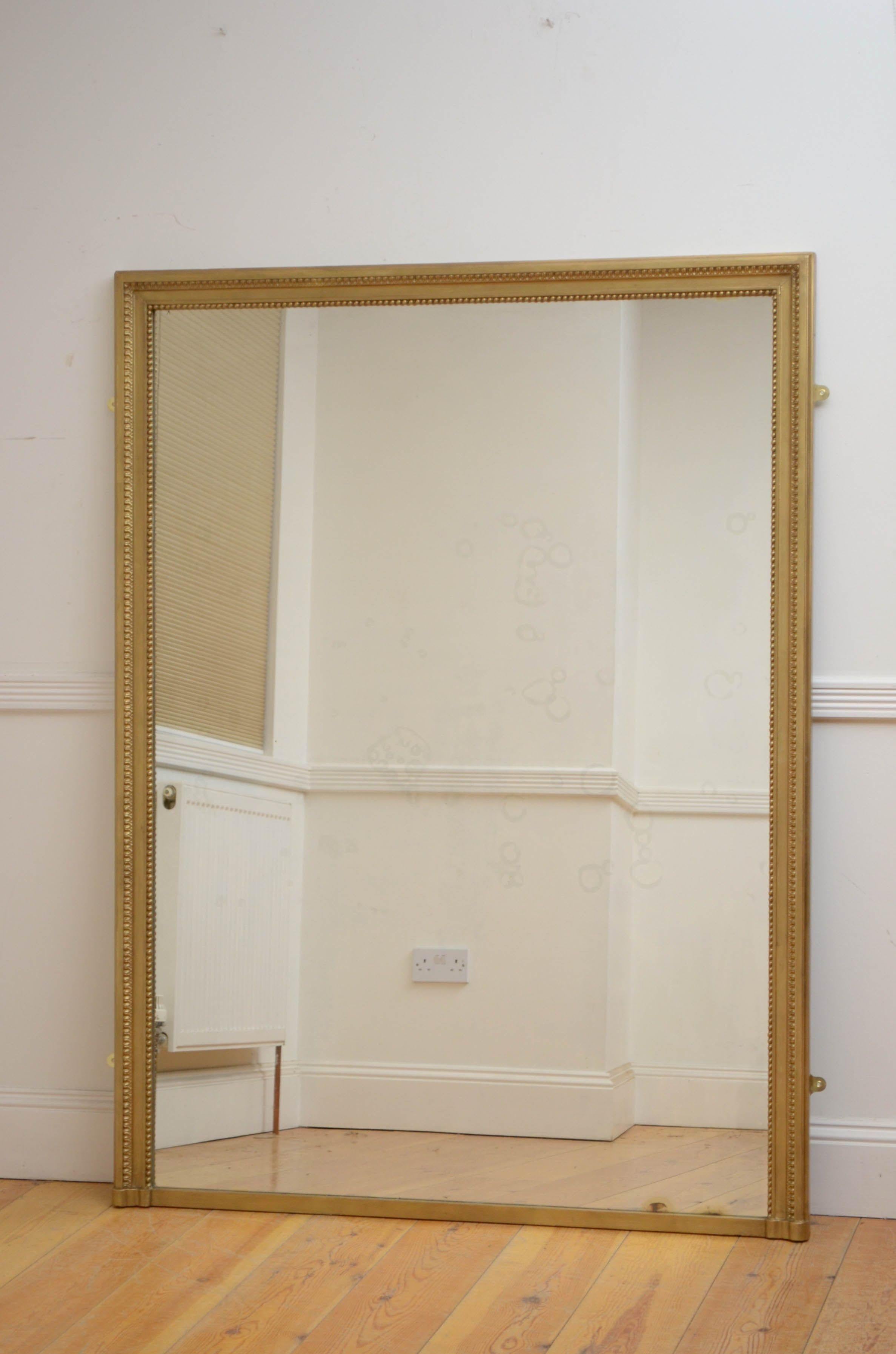 Sn5136 Simple and elegant 19th century French wall mirror, having original glass with some imperfections in molded gold frame. This antique mirror is in home ready condition. c 1900

Measures: H 65