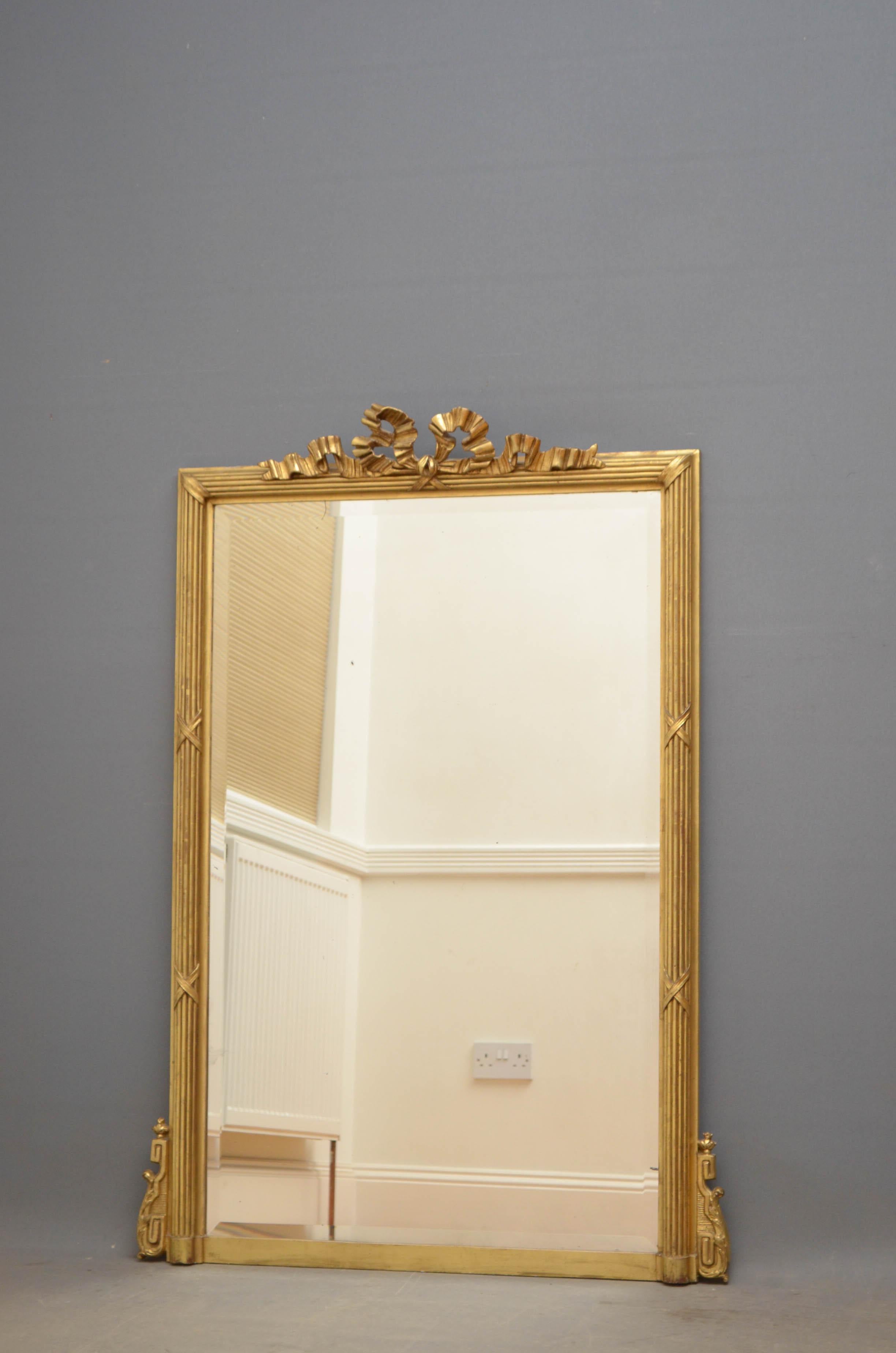Sn4774, elegant turn of the century French wall mirror, having original bevelled edge glass with some foxing in reeded and bow decorated frame with scrolls to base. This antique mirror is in home ready condition, circa 1900
Measures: H51.5