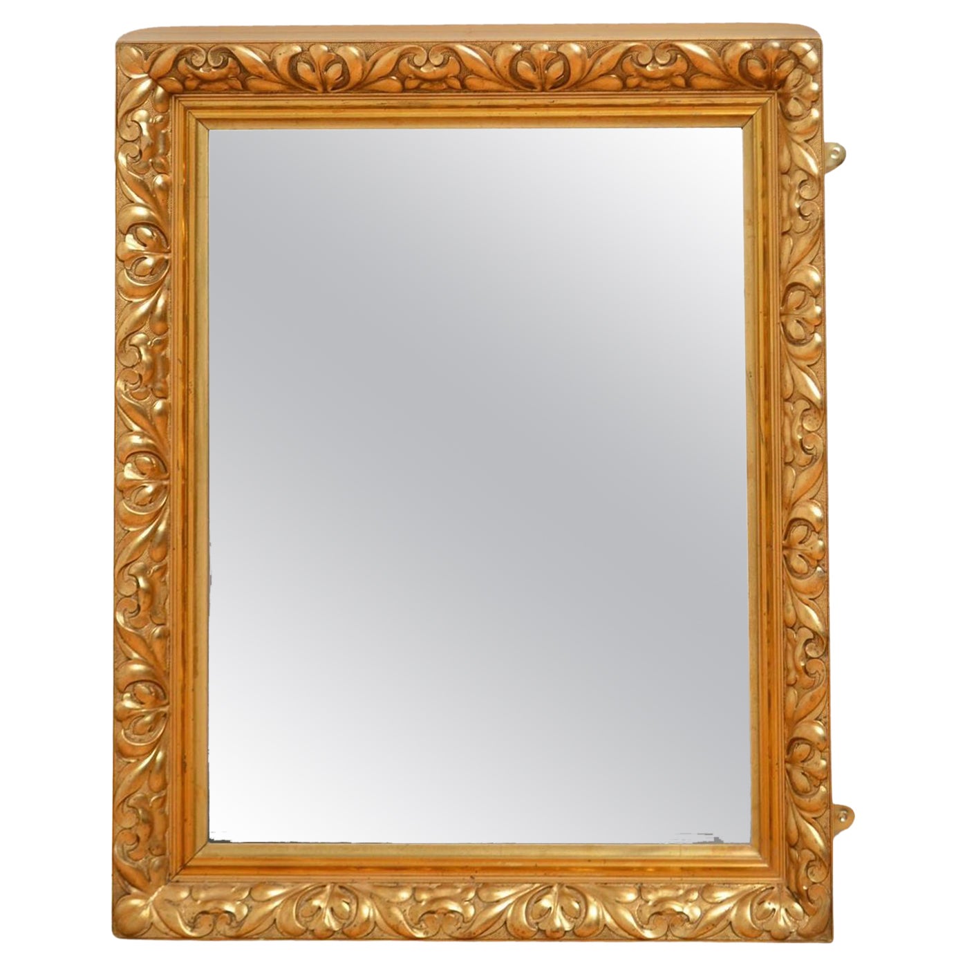 Miroir mural en bois doré du début du siècle H85cm
