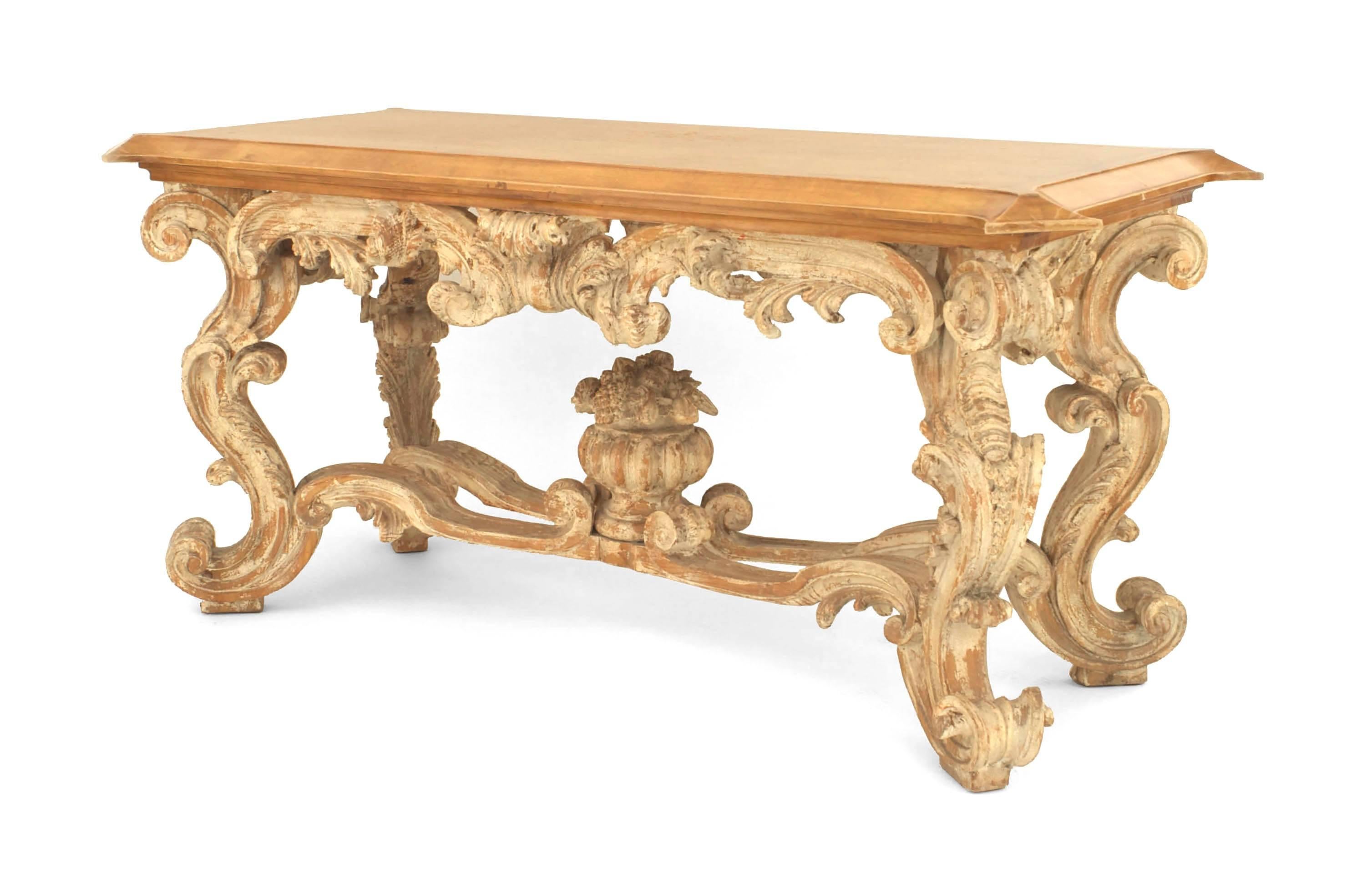 Italian Venetian style (19/20th century) stripped and white painted Rococo carved
rectangular center table with carved 