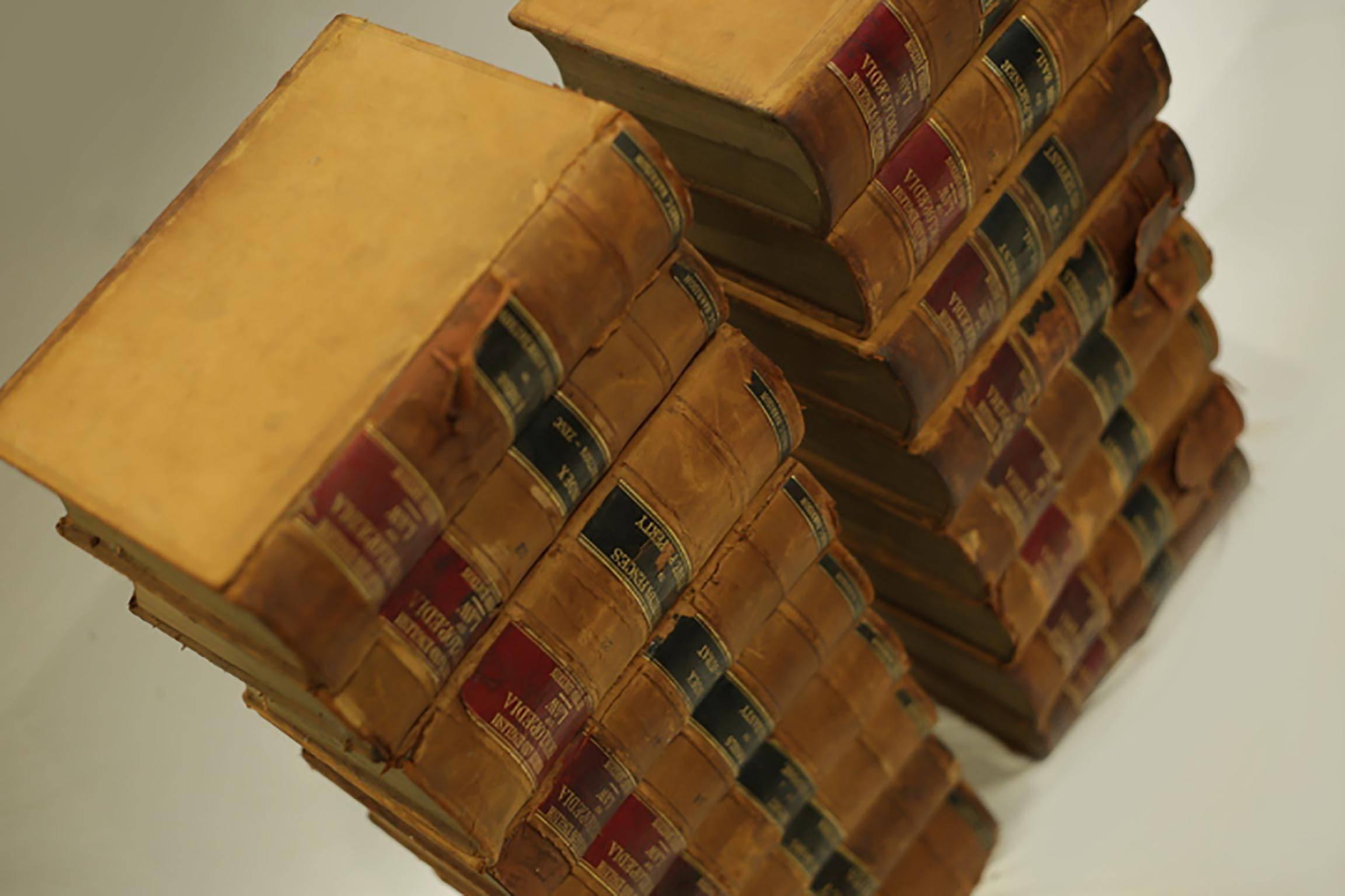 Set of 11 leather bound turn of the century law books that cover various topics such as 