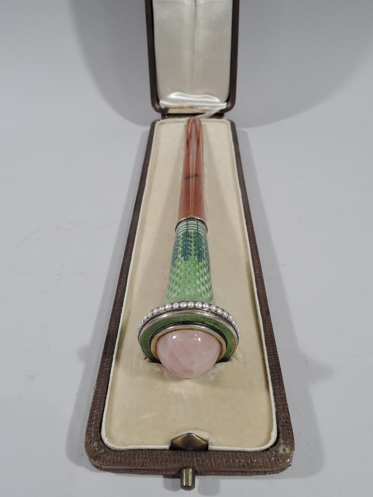 Ramp up your allure with a turn-of-the-century parasol handle. Silver and amber cylinder mounted to cone with enameled stylized vertical leafing branches on green guilloche basket-weave ground. Silver rim with seed-pearl border and cabochon-cut pink