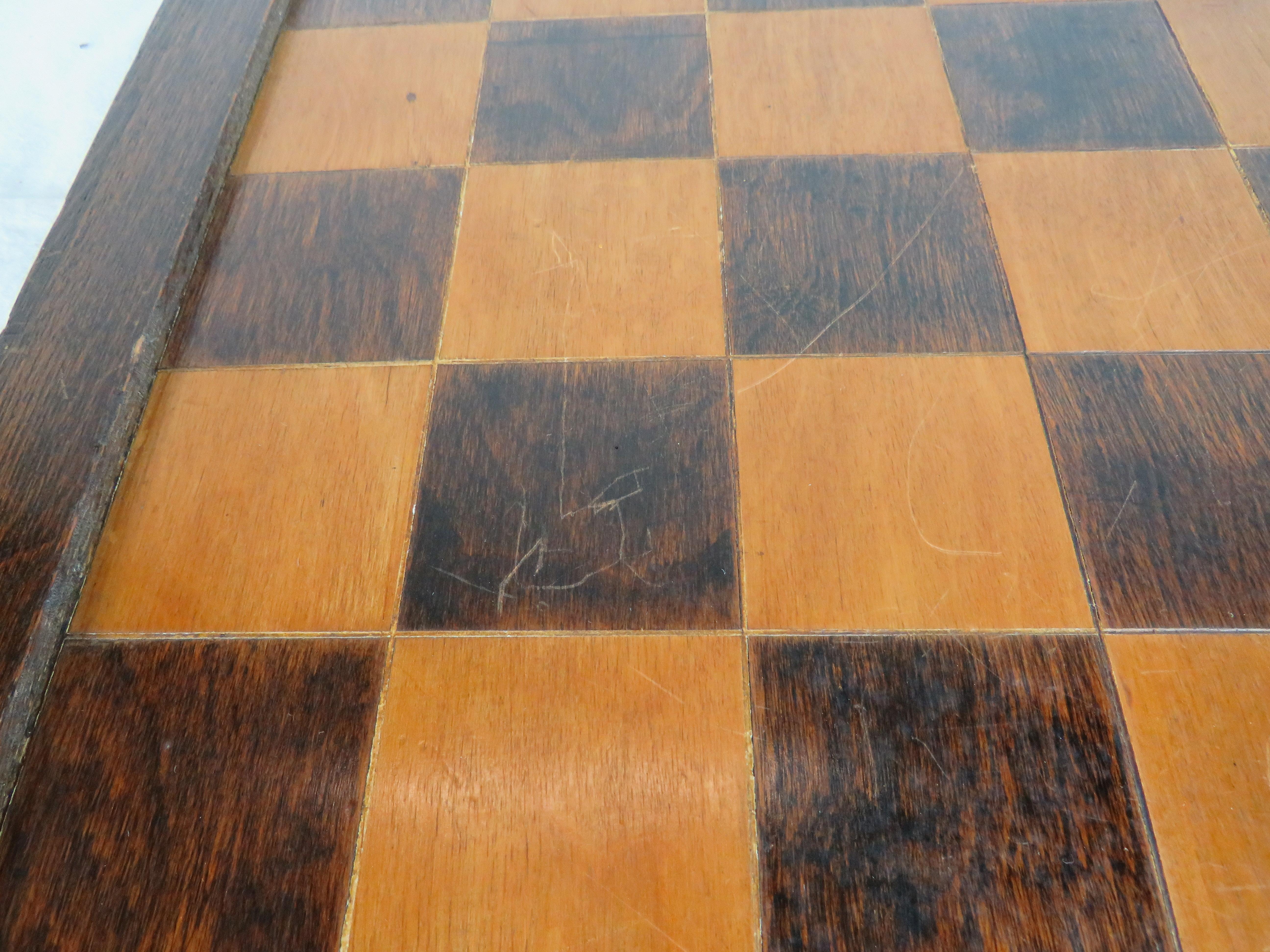 Late 19th/early 20th century checkerboard with inlaid contrasting woods. Converted to wall hanging with felted reverse and hanging clip.