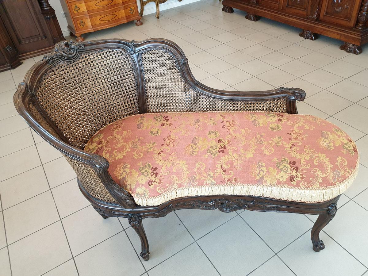 Rococo Revival Turn of the 19th-20th Century Dark Wood Chaise Lounge Finished with Rattan For Sale