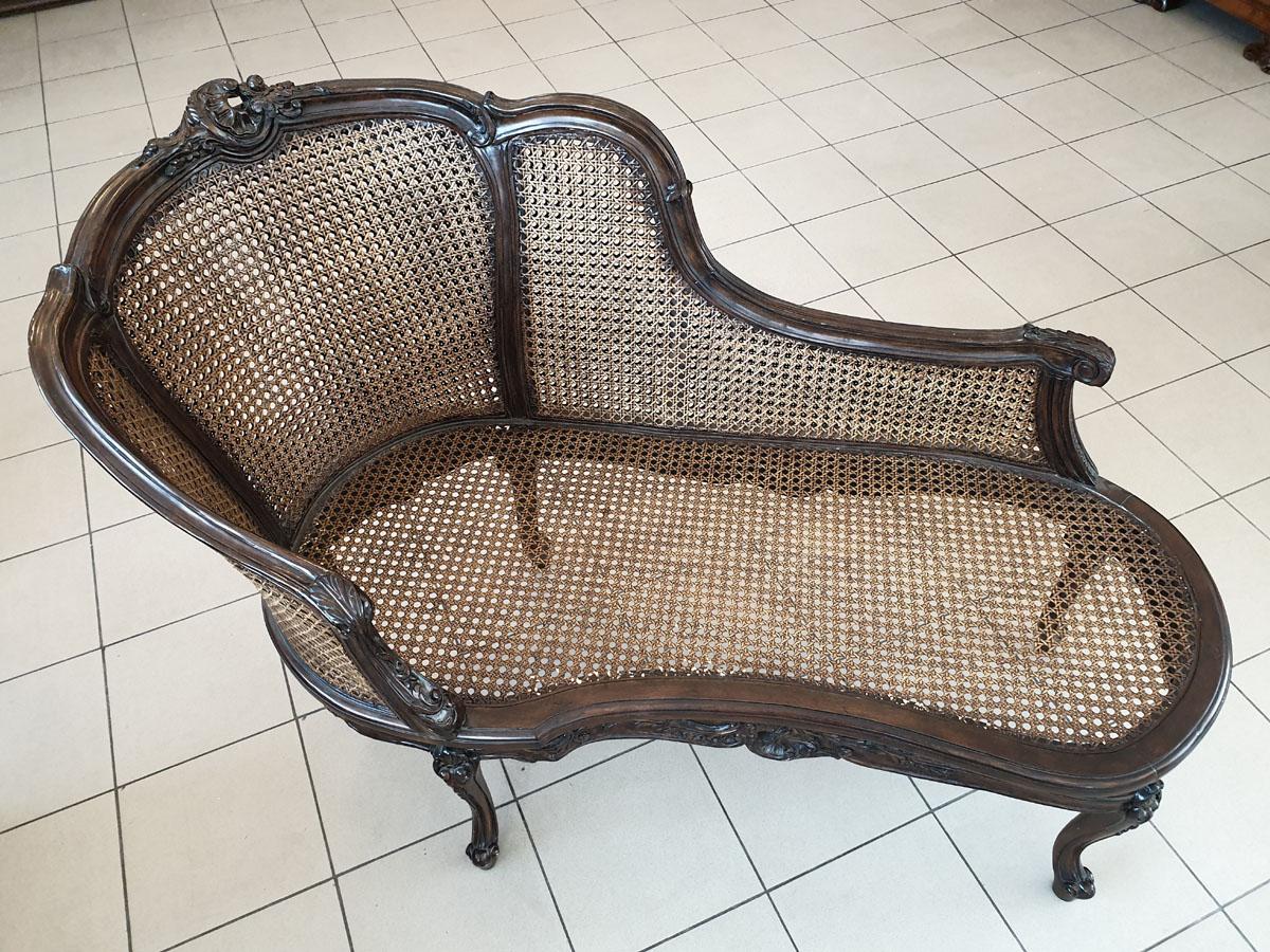 European Turn of the 19th-20th Century Dark Wood Chaise Lounge Finished with Rattan For Sale