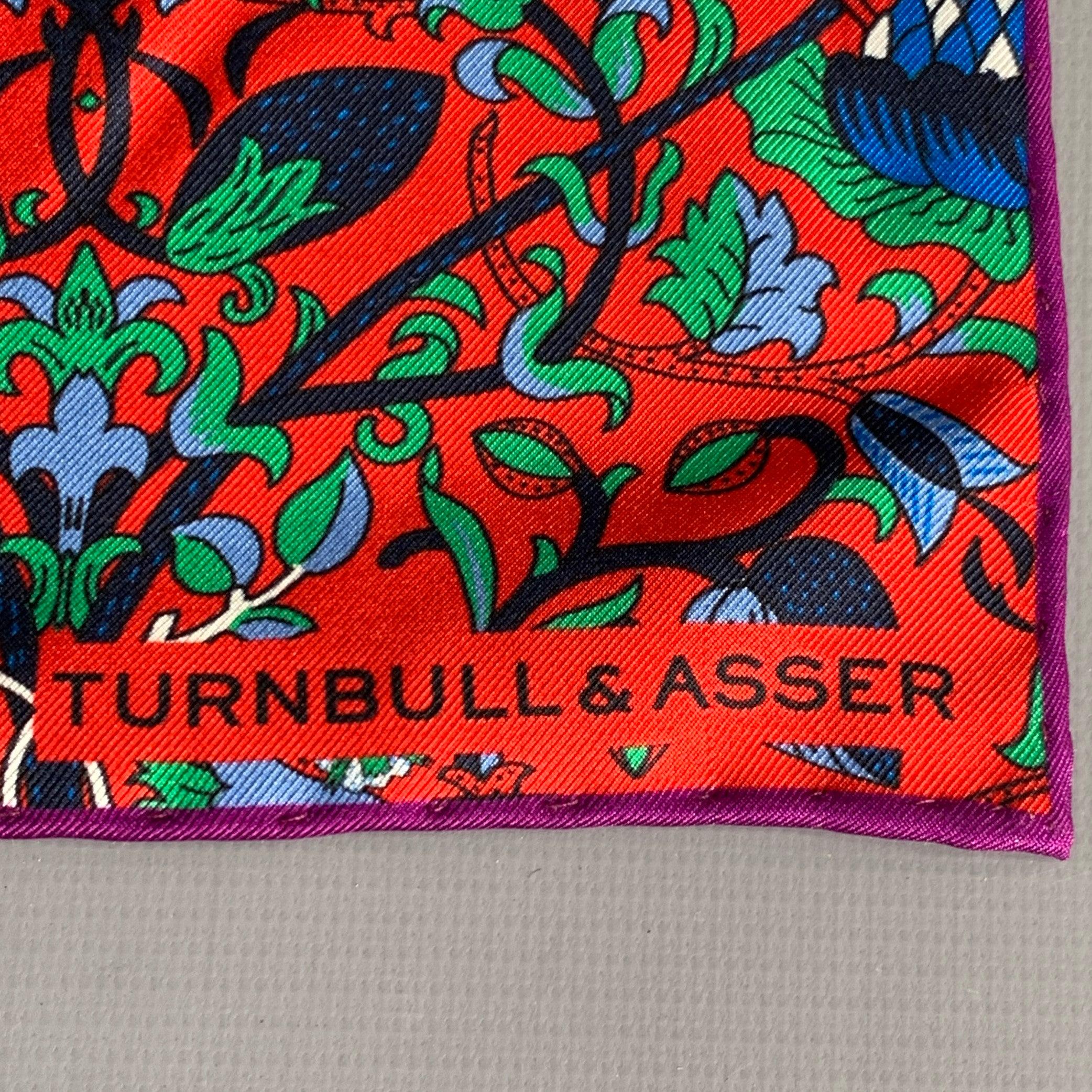 TURNBULL & ASSER pocket square
in a red, navy, and green silk featuring a floral pattern.
Printed in England.Excellent Pre-Owned Condition. 

Measurements: 
  18 inches  x 17.5 inches 
  
  
 
Sui Generis Reference: 135389
Category: Pocket