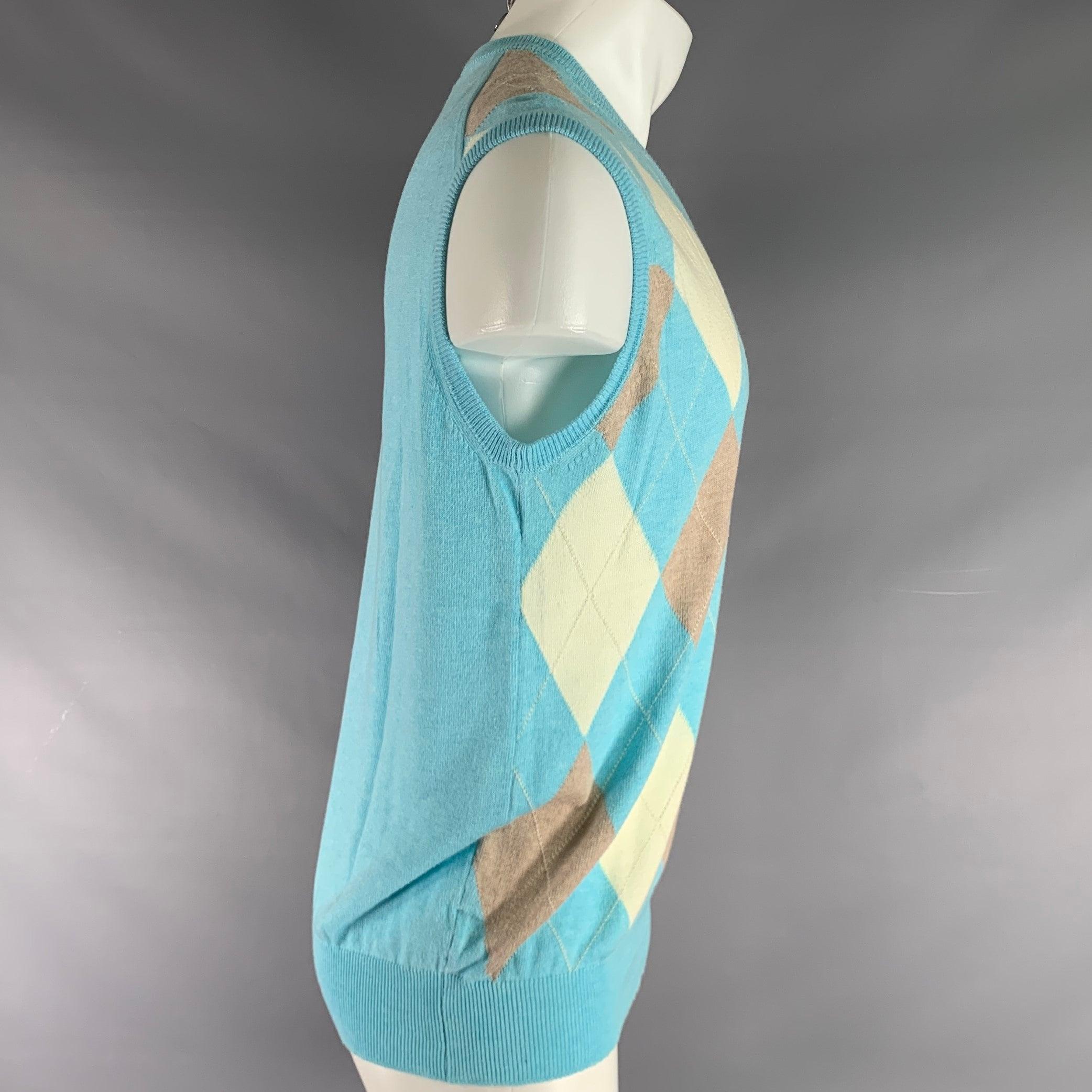 TURNBULL & ASSER sweater vest comes in blue and beige argyle cotton knit with a v -neck. Made in Scotland.Very Good Pre-Owned Condition. Signs of wear. 

Marked:   M 

Measurements: 
 
Shoulder: 18 inches Chest: 48 inches Length: 26.5 inches 
 
  
 