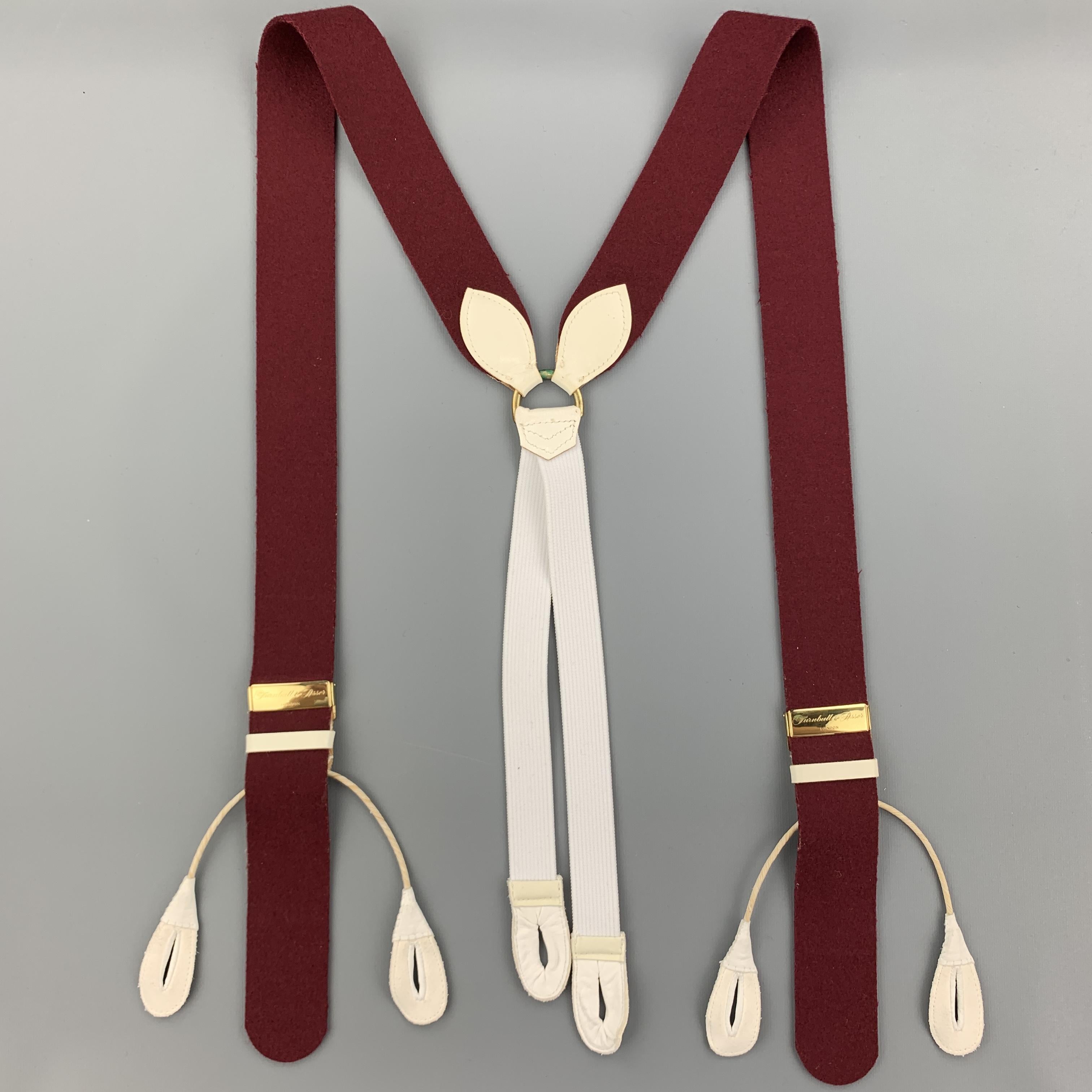 TURNBULL & ASSER suspenders comes in a burgundy wool featuring a adjustable fit, leather trim, and includes trouser buttons. Made in England.

Excellent Pre-Owned Condition:

Measurements:

Width: 1.5 in.