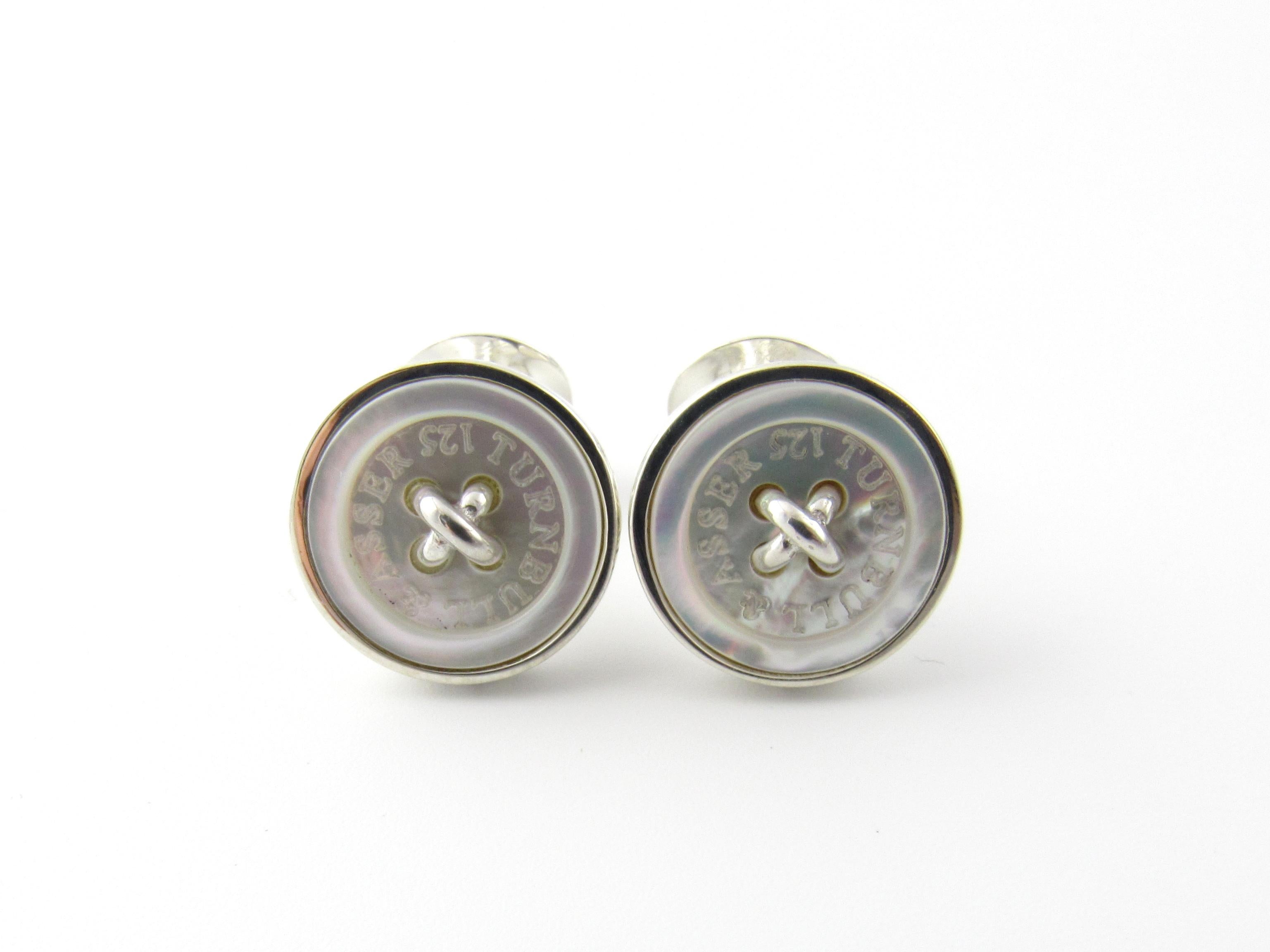 Vintage Turnbull & Asser Sterling Silver and Mother of Pearl Button Cufflinks

These elegant cufflinks each feature a button front design beautifully crafted in mother of pearl and sterling silver. Made in England.

Size: 11 mm

Weight: 11.5 dwt. /