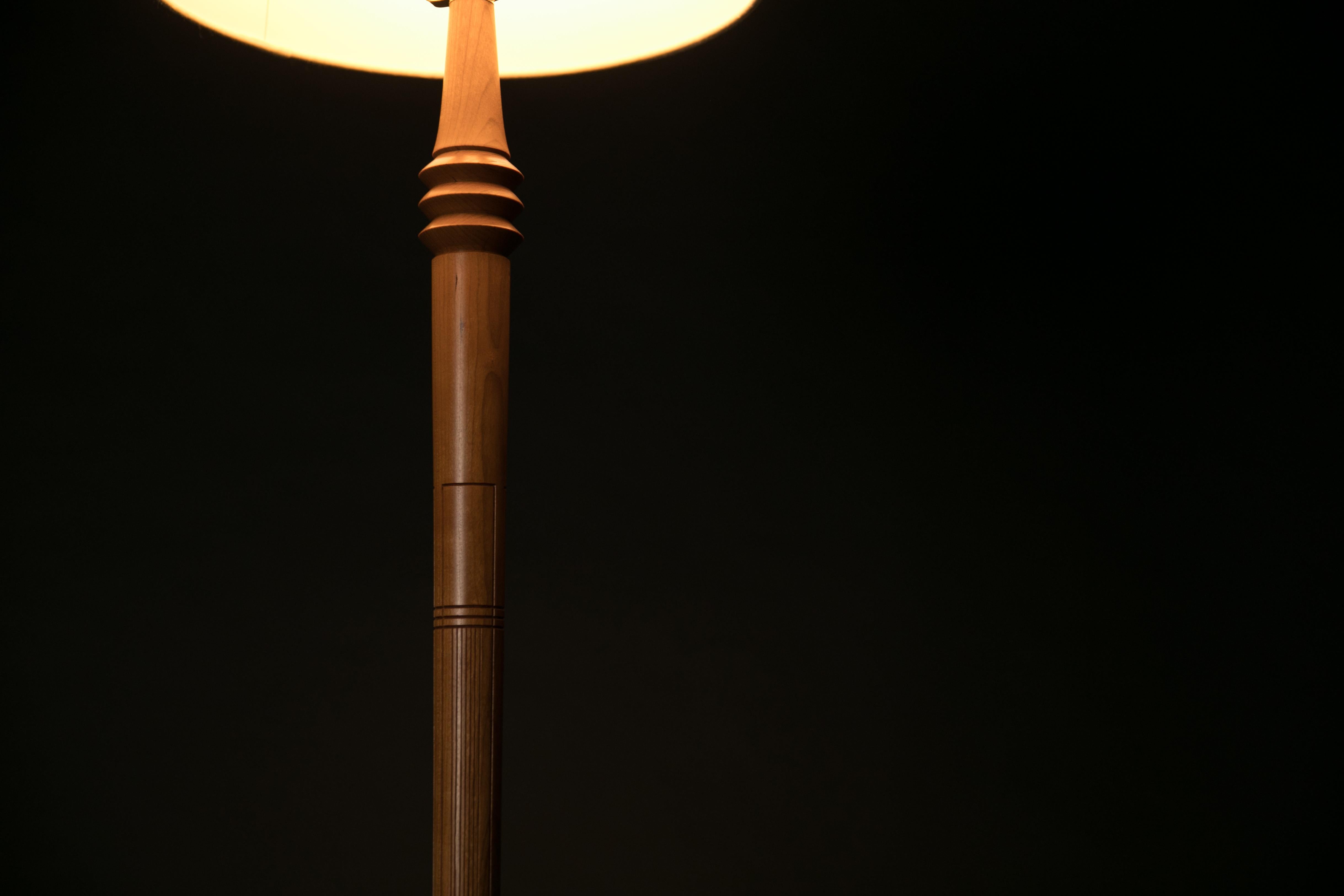 turned wooden floor lamp