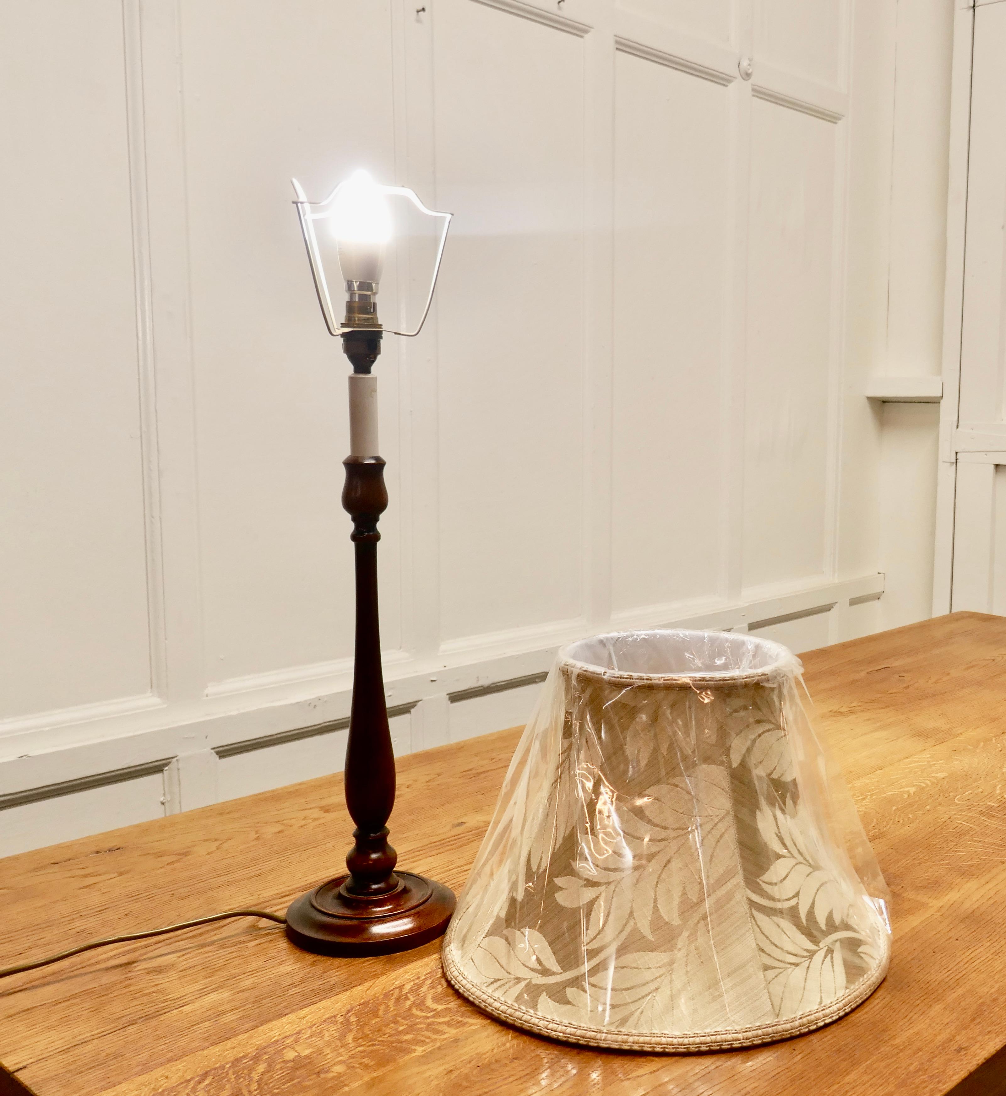 20th Century Turned Mahogany Table Lamp For Sale