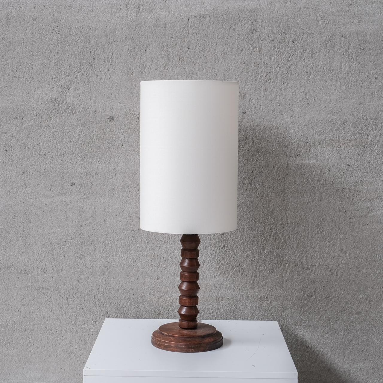 Turned oak art deco table lamp, paired with new shade. 

France, c1940s. 

Since re-wired and PAT tested. 

Good vintage condition. 

Location: Belgium Gallery. 

Dimensions: 20 Diameter x 55 Height in cm. 

Delivery: POA

We can ship around the