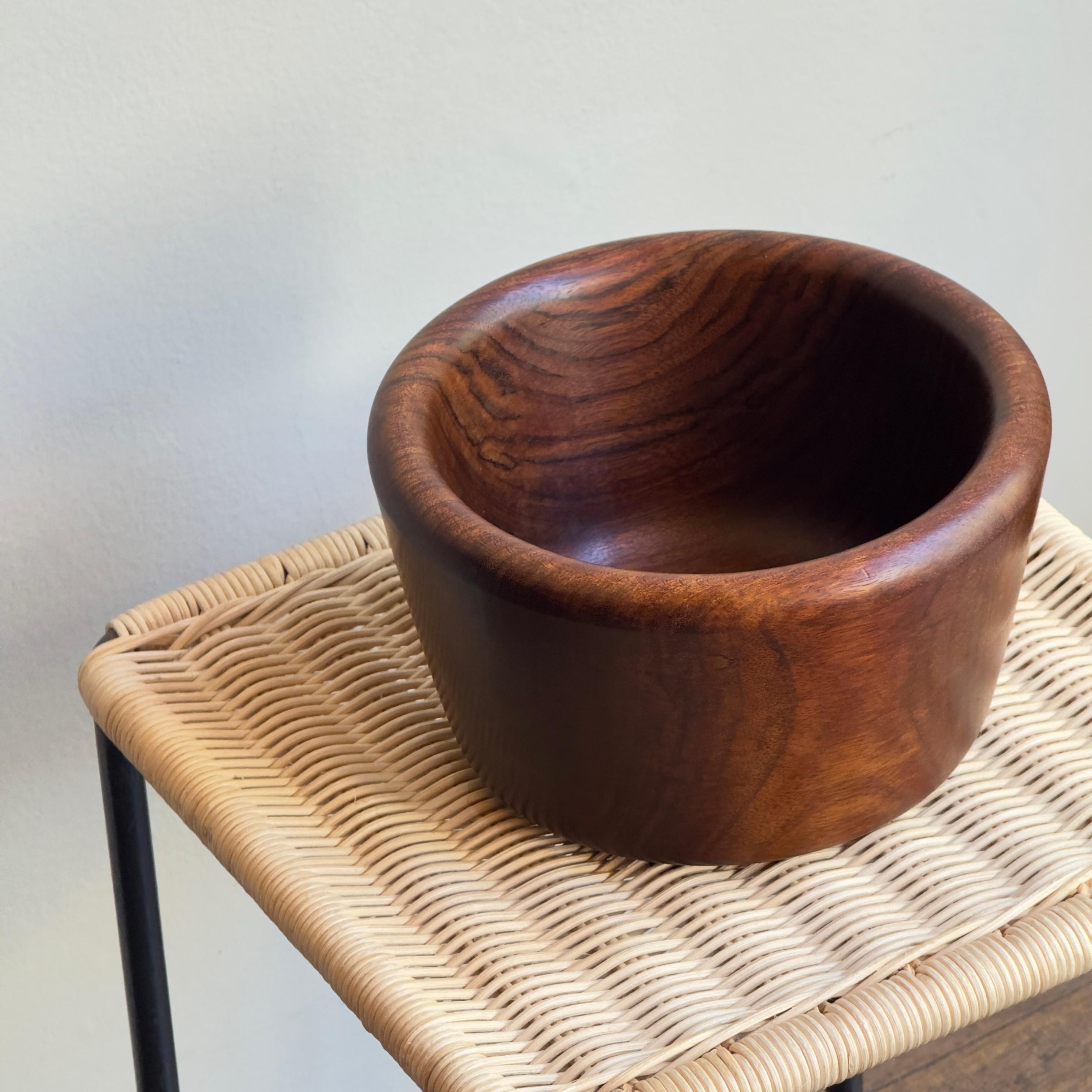 Description:

A turned walnut bowl designed by Carl Auböck III during the 1960s.

Walnut is a recurring material seen throughout the designs of the prestigious Austrian workshop. From coat hangers and corkscrews by Carl Auböck II, to this turned
