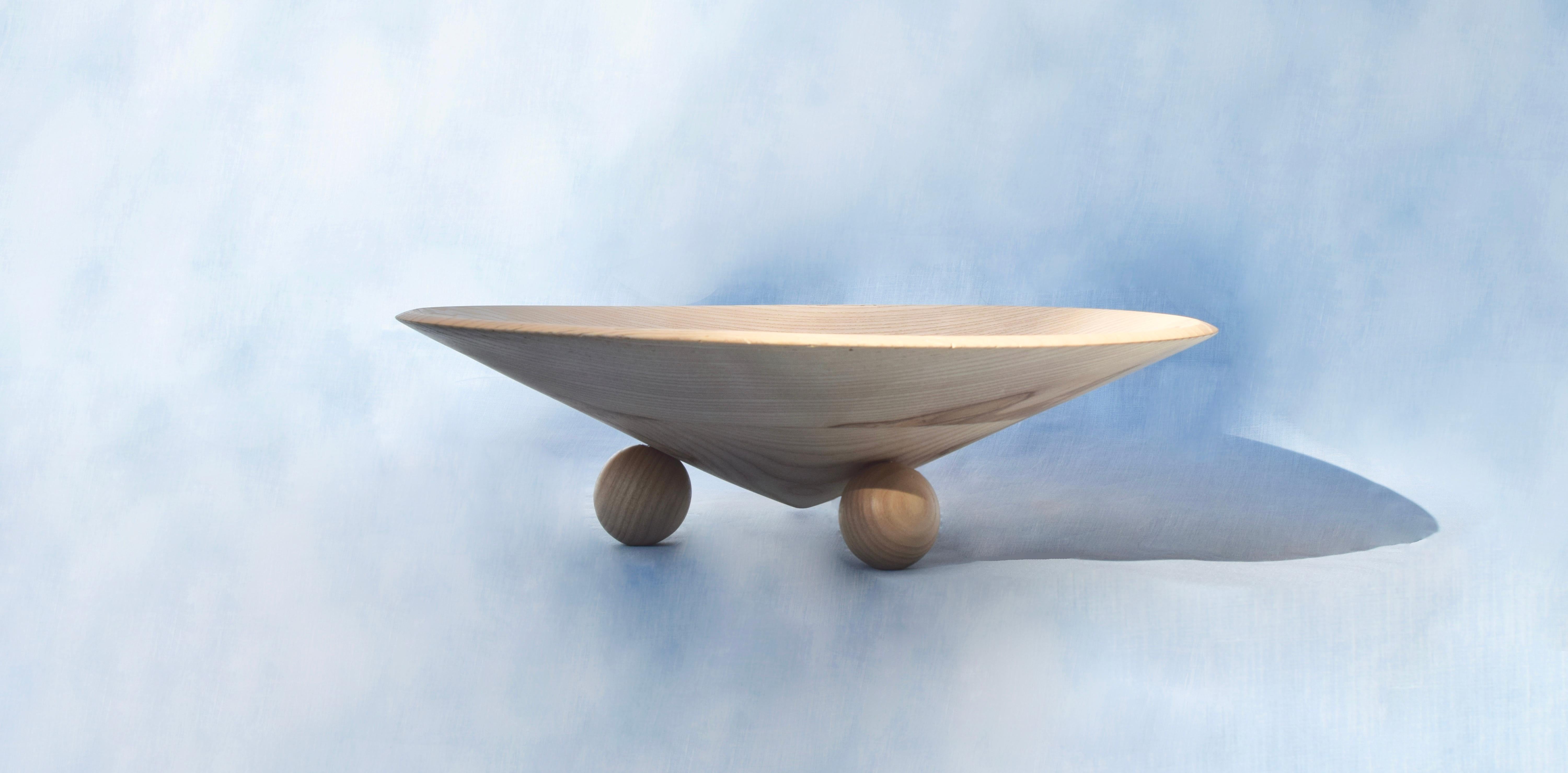 Wood turning requires precise and confident hands as well as a high level of knowledge of the material. With his half-century-old routine, Jenő Köpf turns exceptionally large raw logs into objects of use. 

Material: 100% natural ash wood. Treated