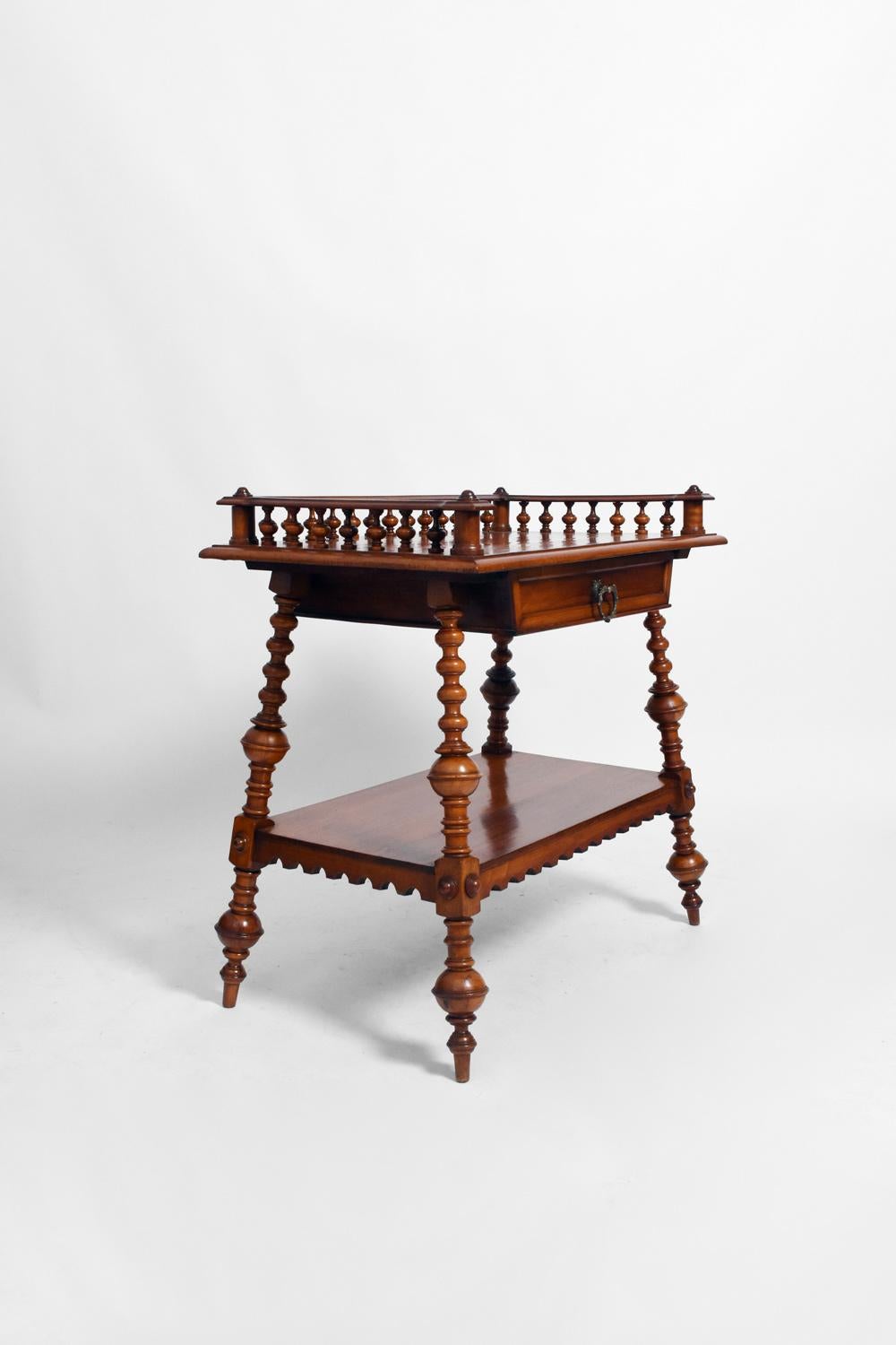 Console table in turned wood resting on four tapered legs, a frieze drawer under the top. England, late 19th century.