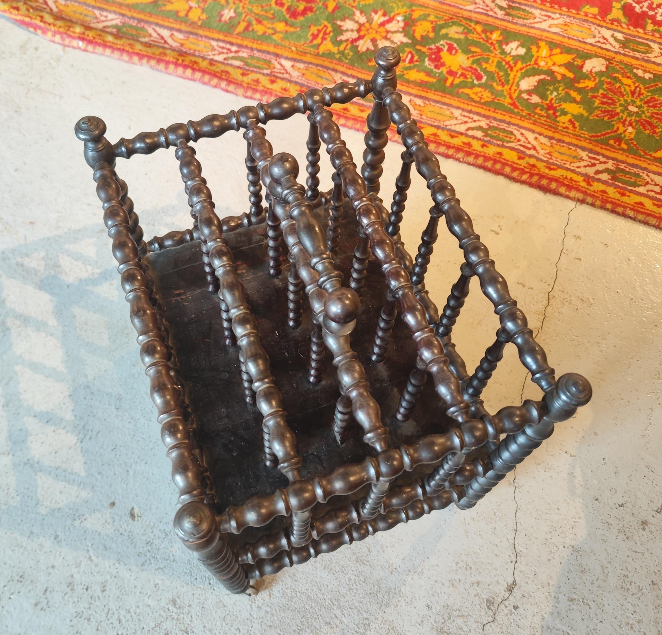 Turned Wood Magazine Rack with Brass Wheels and Handle in the Centre For Sale 2