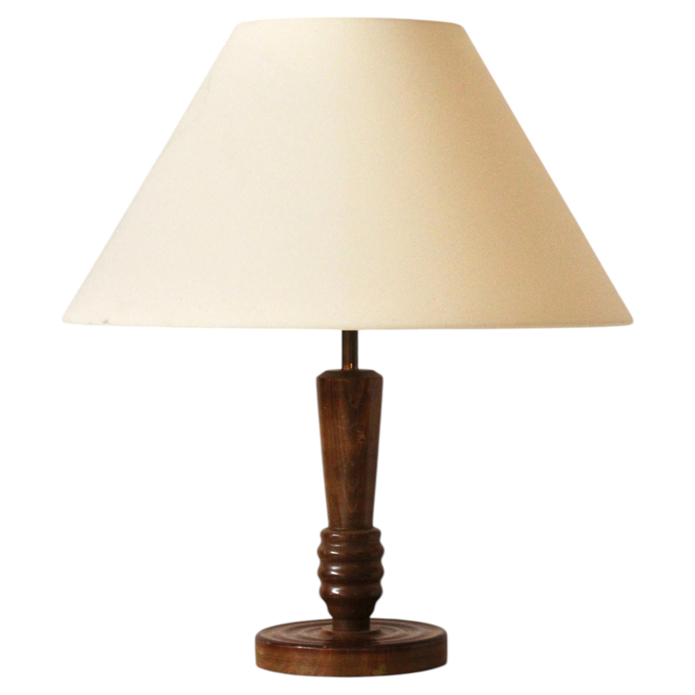 Lampe de table en bois tourné, attribuée à Charles Dudouyt, France, années 1930