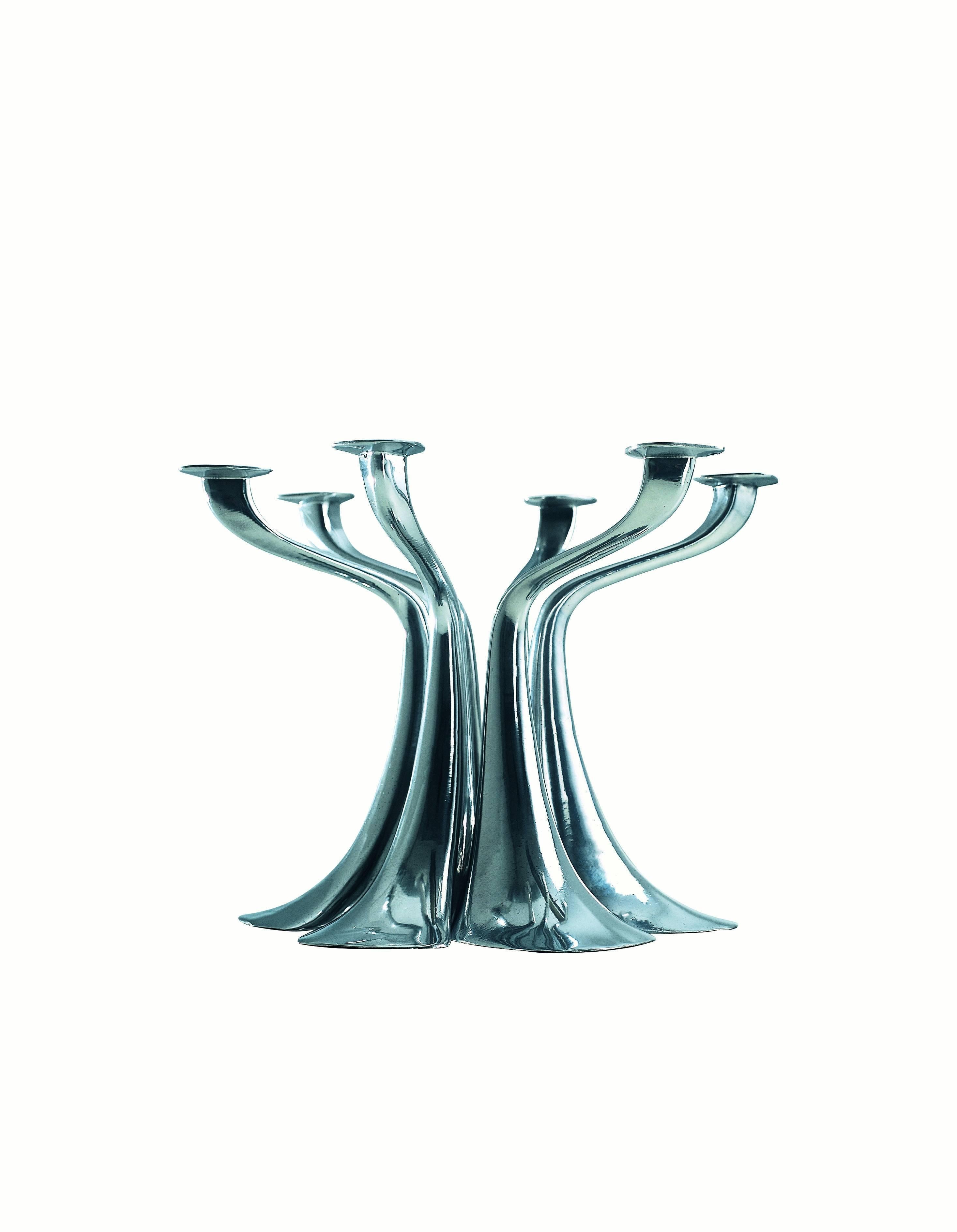 Graceful and charming by itself; romantic in a pair (like a pas-de-deux); mysterious in a group of six, like in a forest: this candleholder by Xavier lust knows how happily spend different lives.

Born in bruges, belgium in 1969, he got his degree