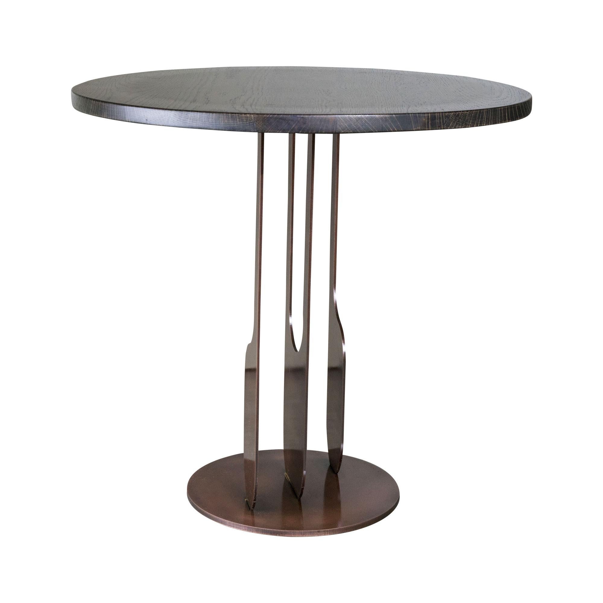 Round side table with copper finished steel base and stained oak top.