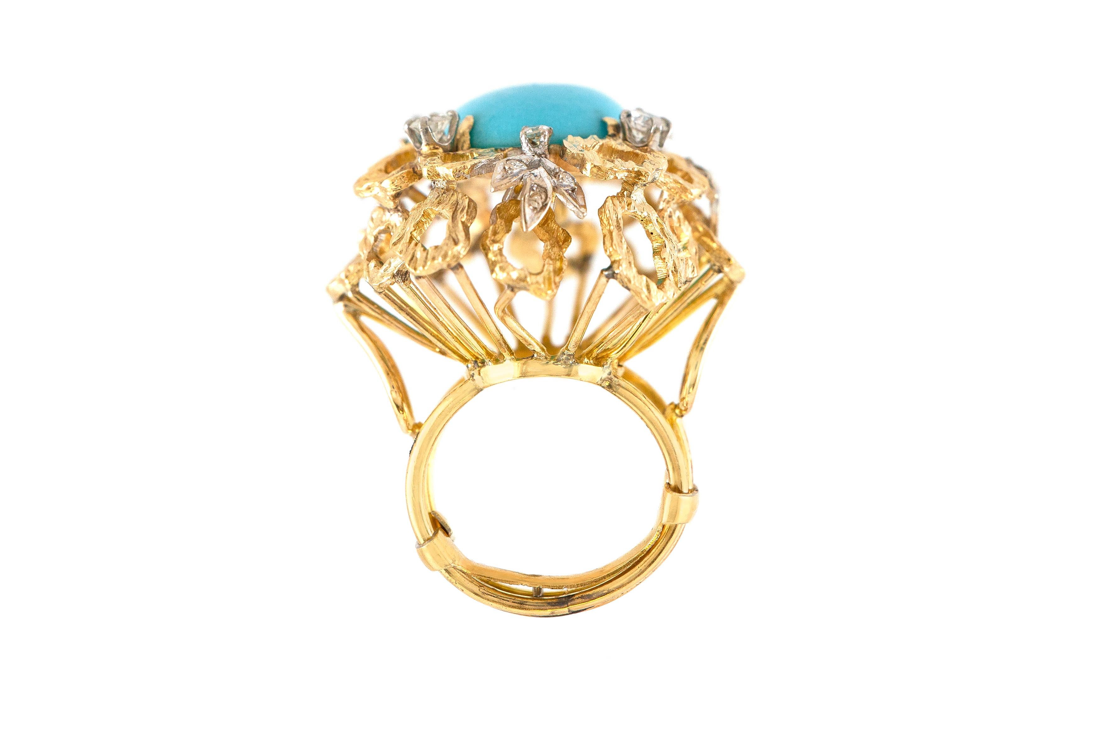 The ring is finely crafted in 14k yellow gold with center stone turquoise and diamonds weighing approximately total of 1.00 carat.