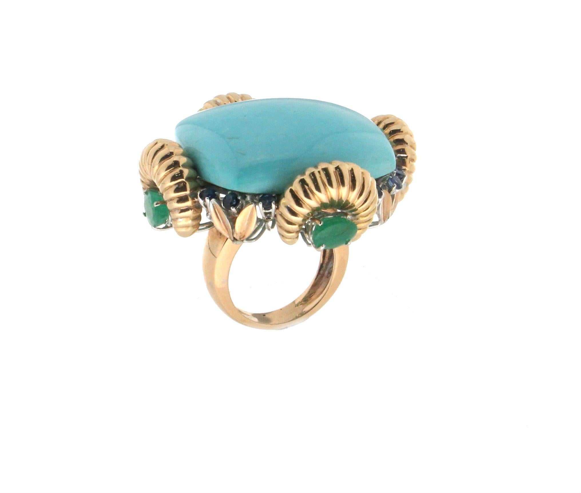 Turquoise(from Arizona) 18 karat yellow gold mounted with emerald,sapphires cocktail ring

Ring weight 44 grams
Emerald weight 3.34 karat
Sapphires weight 1.25 karat
Ring size 8.25 Us 17.50 ita

