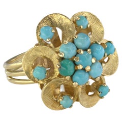 Türkis-Blumenring aus 18 Karat Gelbgold