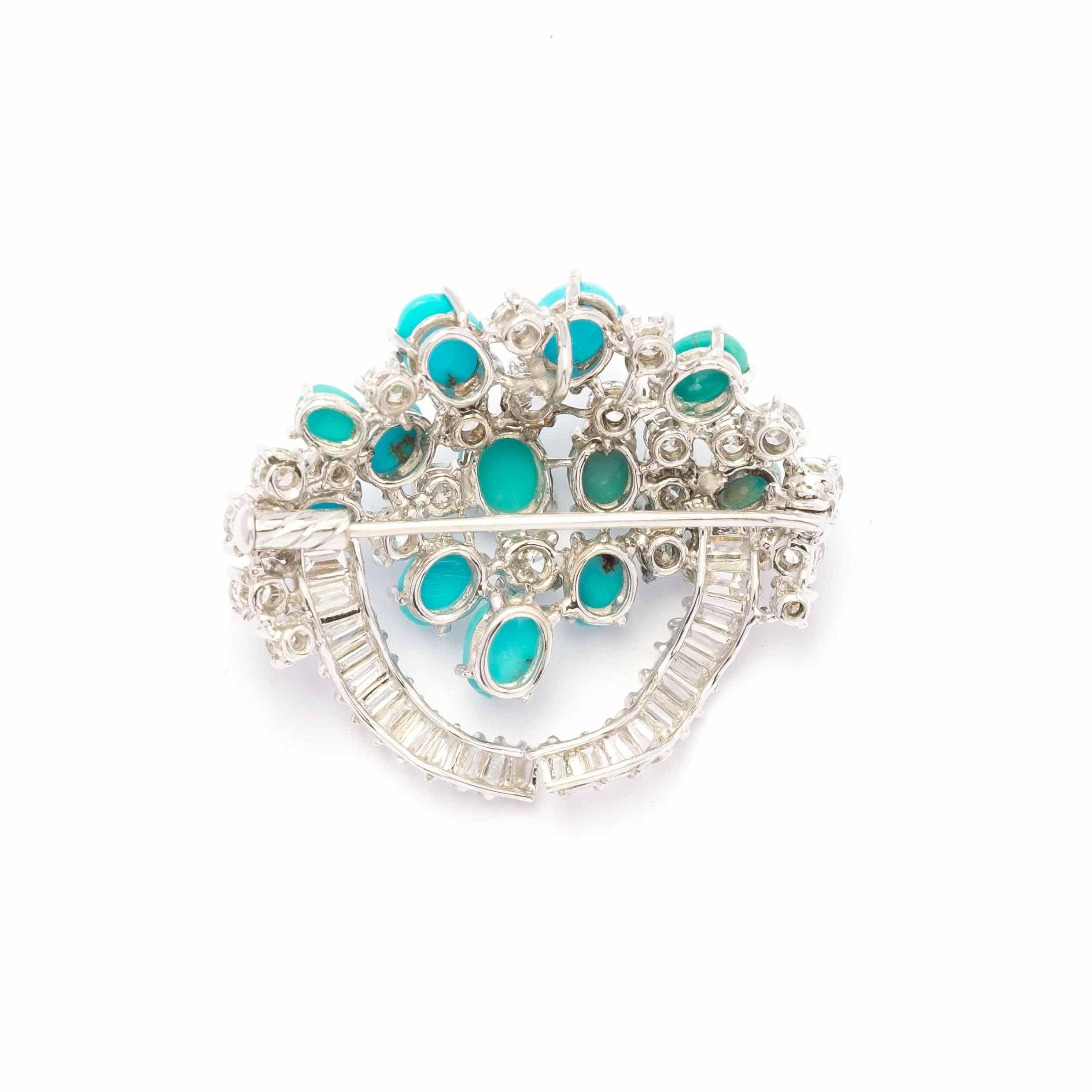 Beautiful 1960s period brooch, set in 18ct white gold with good white quality diamonds and natural turquoise. The diamonds are round and baguette cut for a total of circa 2.5ct.

Highlights:
- 18ct white gold
- Round cut diamonds 1.5ct total c.a.
-