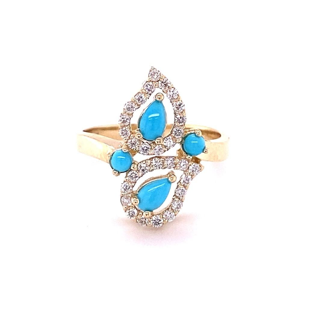 Turquoise and Diamond 14 Karat Yellow Gold Cocktail Ring

Super pretty and dainty everyday ring that is sure to be a great addition to your accessory collection!!

This ring has Pear and Round Cut Turquoise stones that weigh 0.47 Carats and 30 Round