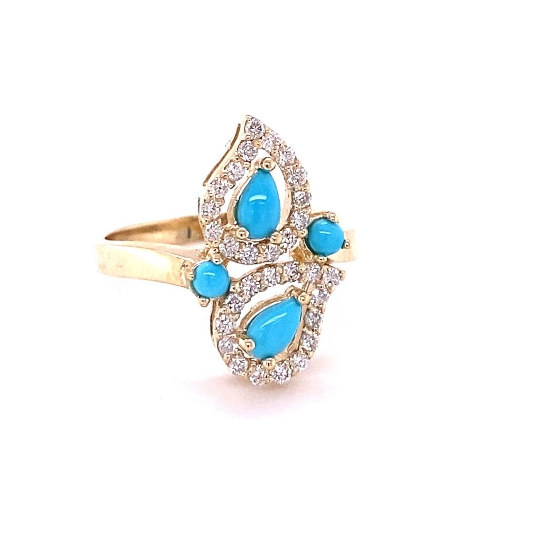 Pear Cut Turquoise and Diamond 14 Karat Yellow Gold Cocktail Ring For Sale