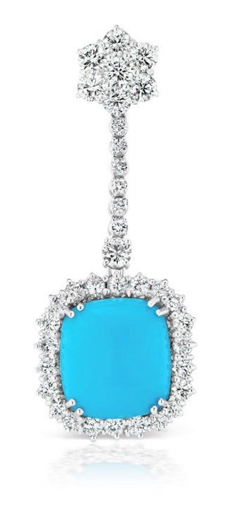 Cushion Shaped Cabochon Turquoise Drops surrounded by Round Brilliant Diamonds and suspended from flower motif Diamond Studs with a straight line of diamonds.
Set in 18 Karat Gold.
Made in Italy.