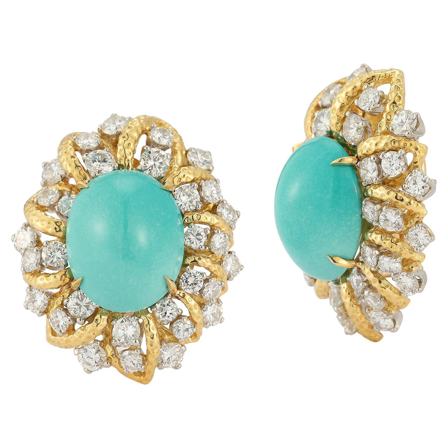 Turquoise and Diamond Earrings by David Webb 

Cabochon turquoise surrounded by round cut diamonds set in 18 karat yellow gold.

Measurements: 1