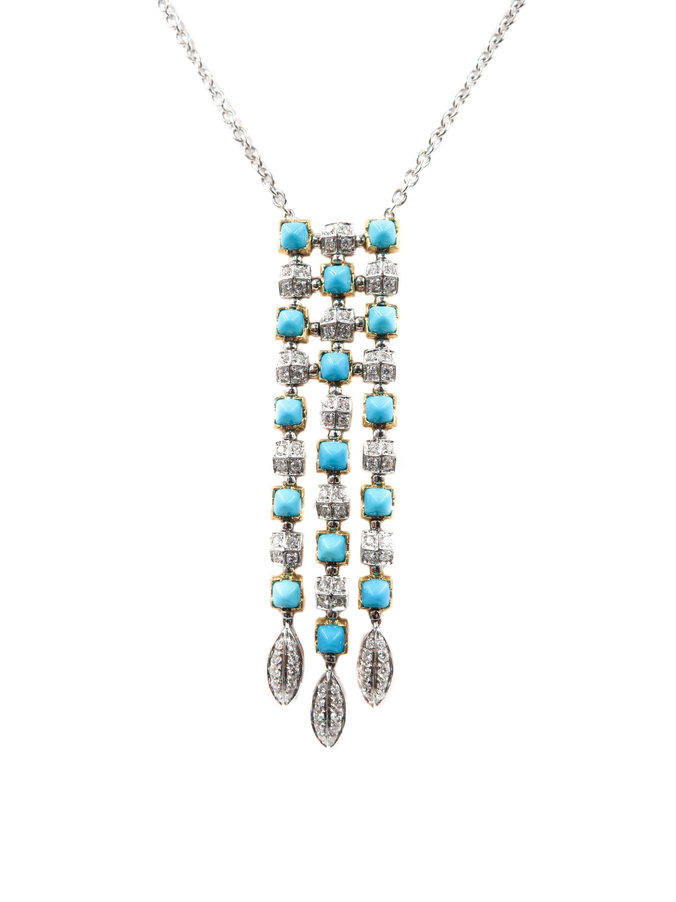 An amazing turquoise necklace accented by pave-set round diamonds lending contrast to the refreshing color of this fashionable estate necklace. Crafted in 18k yellow and white gold, the pendant portion of the necklace suspends from an adjustable 16-