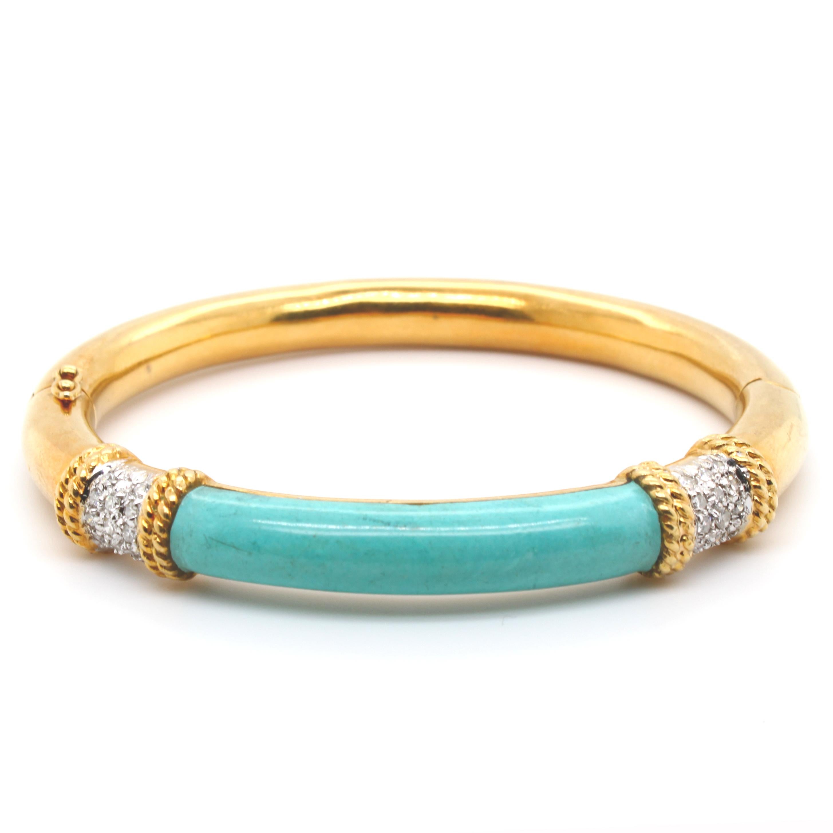 A lovely everyday gold bangle with an unusual curved turquoise top in yellow gold. It is bordered by gold wires and round brilliant cut diamonds. The bangle has a hinge and big opening as well as a security clasp for easy and secure wearing. The
