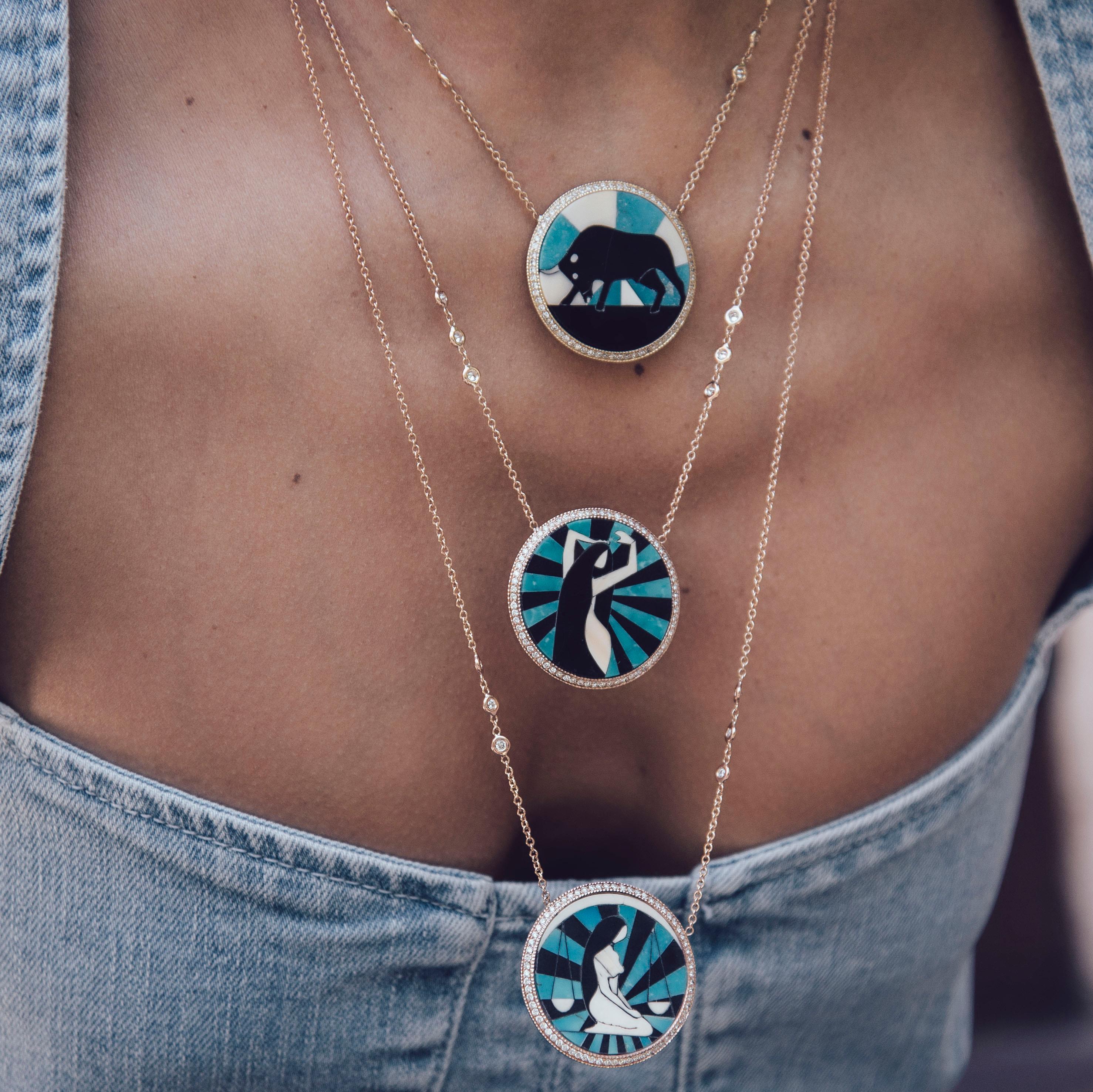 Hand inlay lapis, turquoise, onyx and bone pendants with a pave diamond border for every Zodiac sign. Wear yours, your lover's, or your baby's. 
18