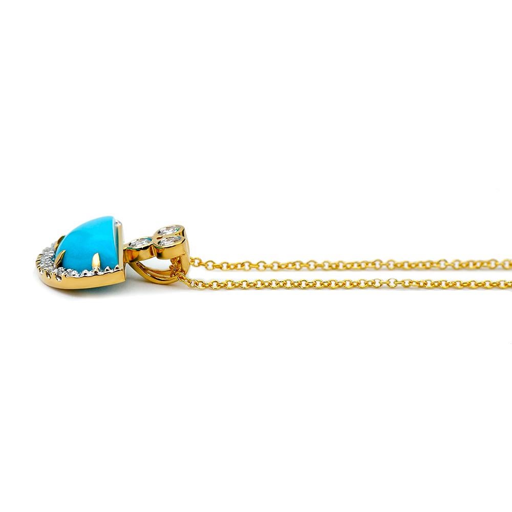 This necklace is crafted in 18kt yellow gold and features a half moon shaped non-stabilized natural turquoise from the Sleeping Beauty Mine in Arizona weighing a total of 2.12 ct. The half moon is enhanced by white diamonds set along the outer