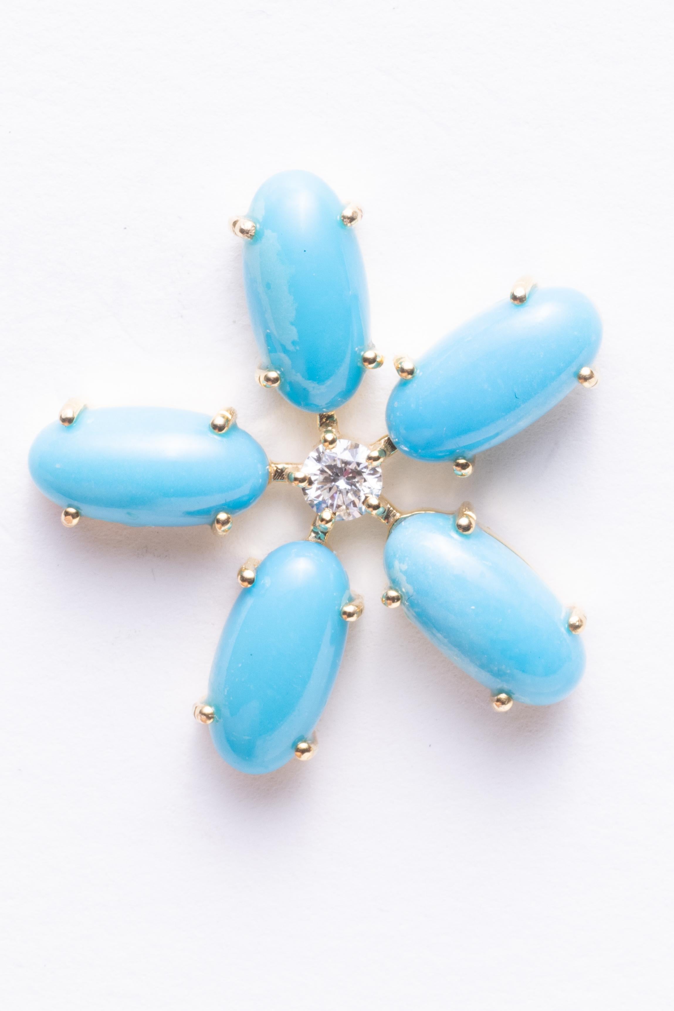 Sleeping Beauty Turquoise in an oval, cabochon shape in a flower motif with a center brilliant cut diamond set in 18K gold.  Post for pierced ears.

The fine jewelry collection is sourced, designed or created by Deborah. Through her international