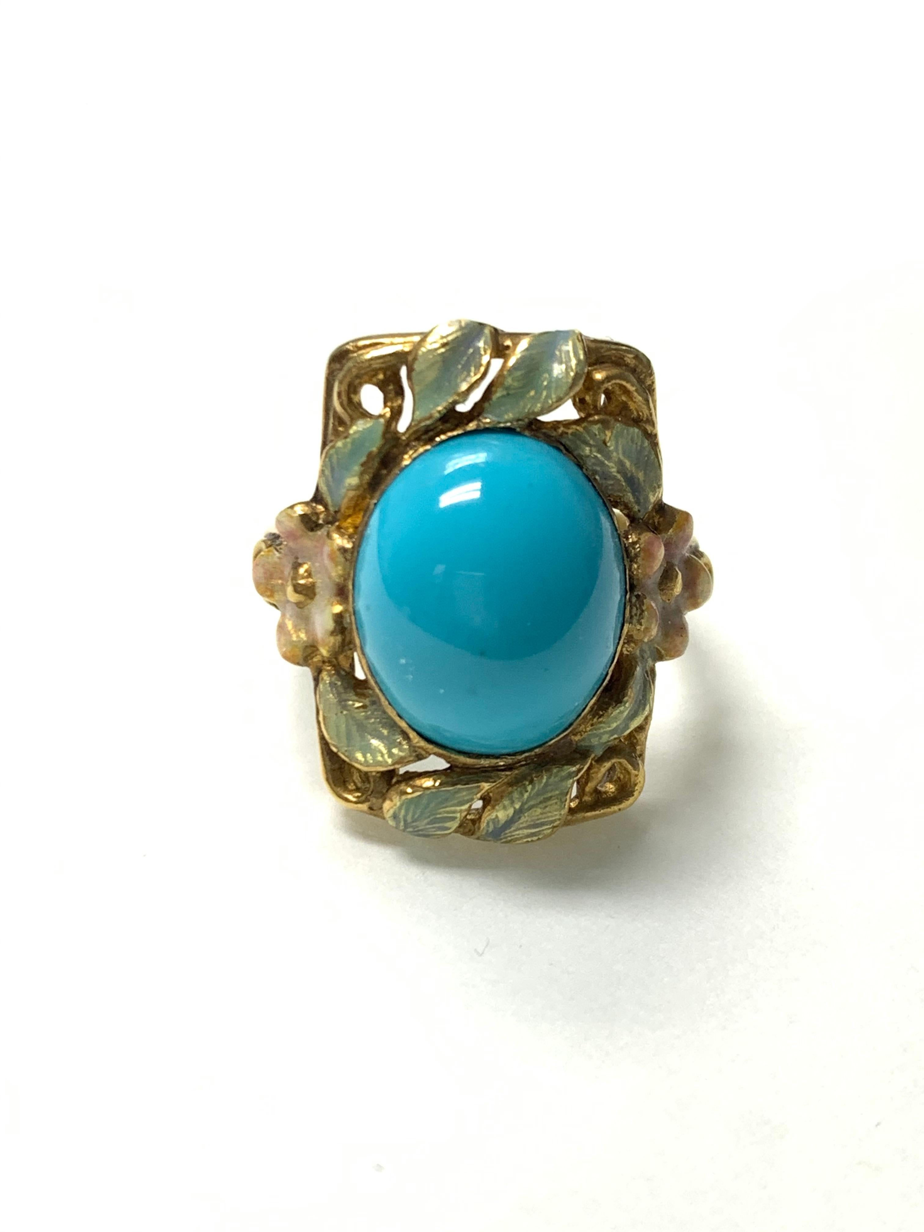 Turquoise and enamel cocktail ring in 18k yellow gold. 
The details are as follows : 
Turquoise measurements : 13 by 11 mm 
Metal : 18k yellow gold. 
Ring size : 6 1/2 
Gold weight : 9 grams 



