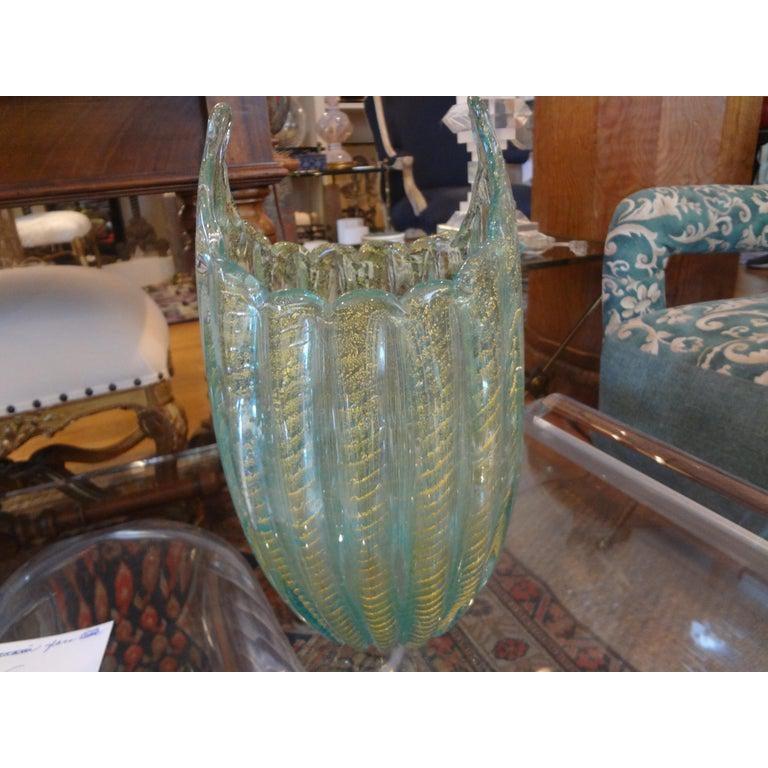 Stunning large Tuquoise and gold Cordanato d'Oro Murano glass vase attributed to Ercole Barovier for Barovier & Toso. This beautiful Murano blown glass ribbed vase is in great condition and dates to the 1950s.