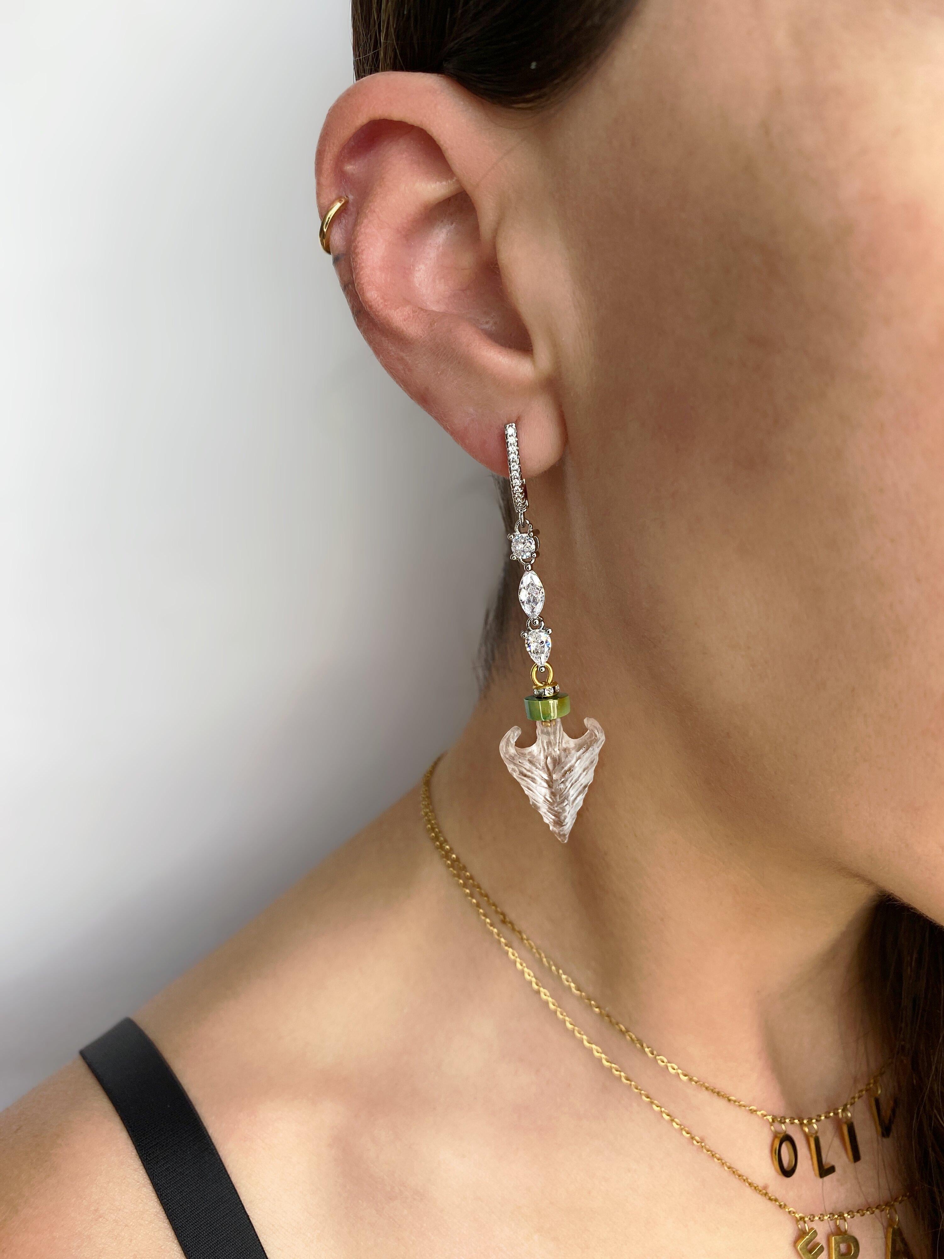 These one of a kind gold plated earrings feature full cut crystal chain with a hanging hand carved Lucite anchor set with natural Turquoise. Lightweight and elegant design by Sebastian Jaramillo.
