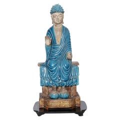 Bouddha sur pied en terre cuite turquoise et dorée à la feuille