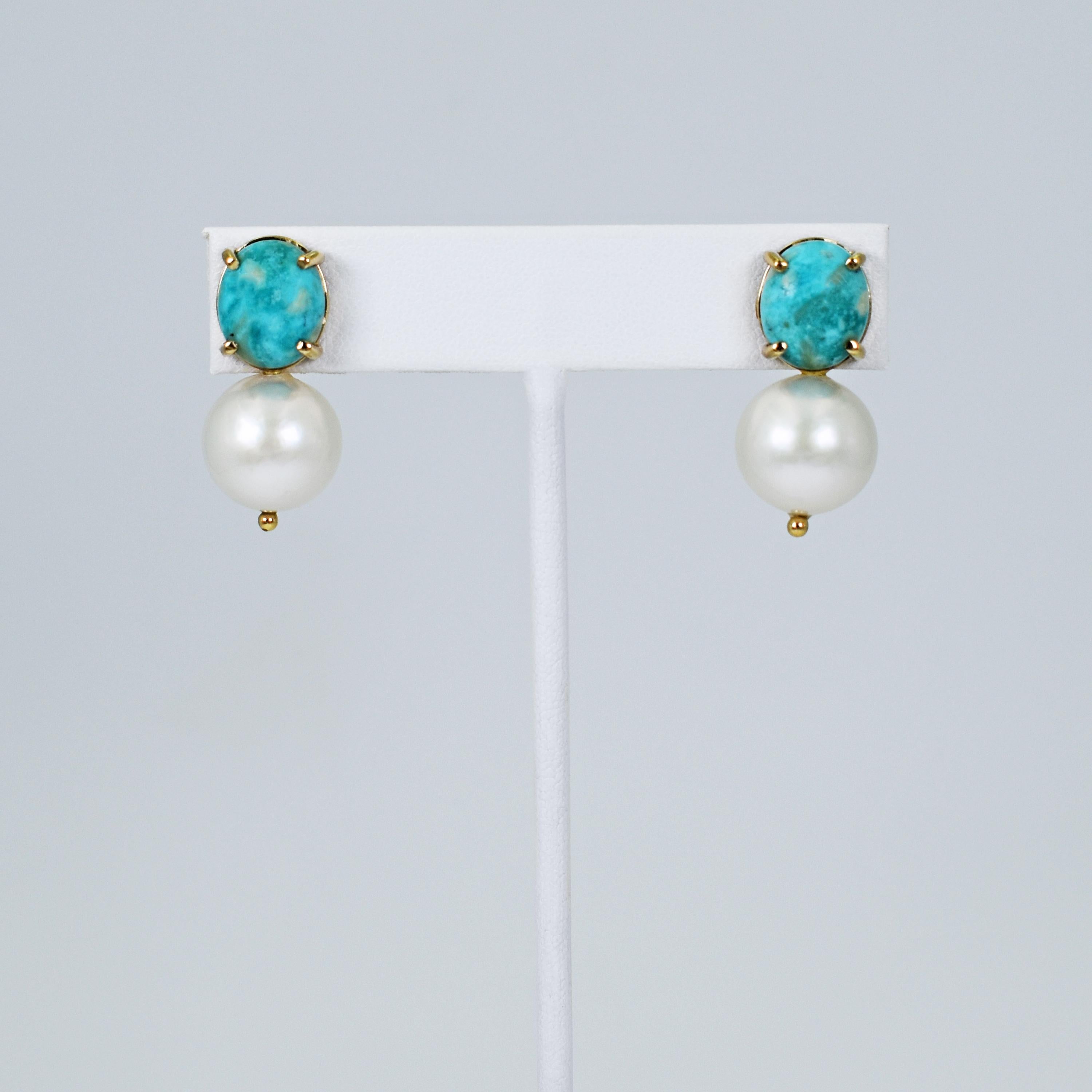 Cabochon-cut Turquoise and round, white 14mm Freshwater Pearl drop 14k yellow gold stud earrings. Stud earrings are 1.13 inches or 30mm in length. Gorgeous Turquoise and Pearl gemstones make these timeless yet contemporary earrings versatile to be