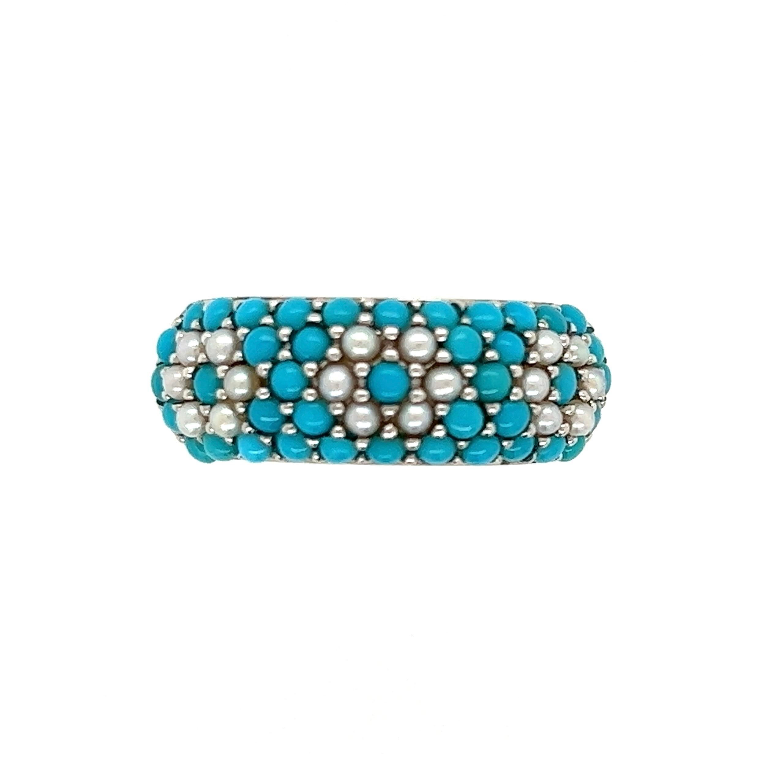 Simply Beautiful! Turquoise and Seed Pearl 5 Row Gold Band Ring.  Hand set with Turquoise and Seed Pearls. Hand crafted in 18 Karat White Gold. Measuring approx. 0.88” l x 0.90” w x 0.31” h. Ring size 7, we offer ring resizing. More Beautiful in