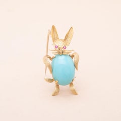 Broche lapin en or 18K turquoise et rubis
