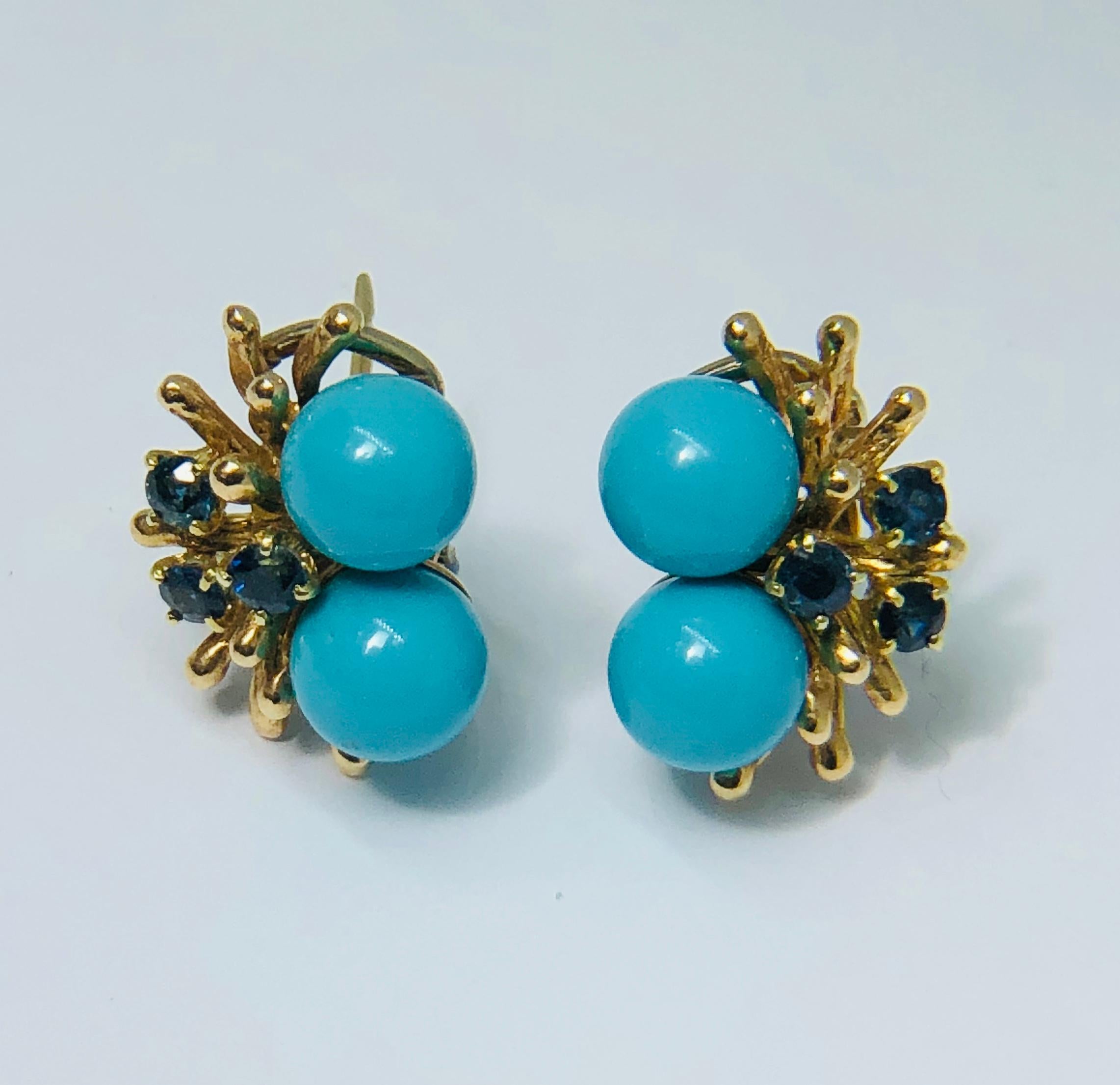 Double Turquoise ball earrings, each set with three brilliant cut sapphires in 14k yellow gold.  Reflecting an oceanic themed design, the earrings are a vivid reminder of blue seas and skies. Nature at its best. Post and omega clip